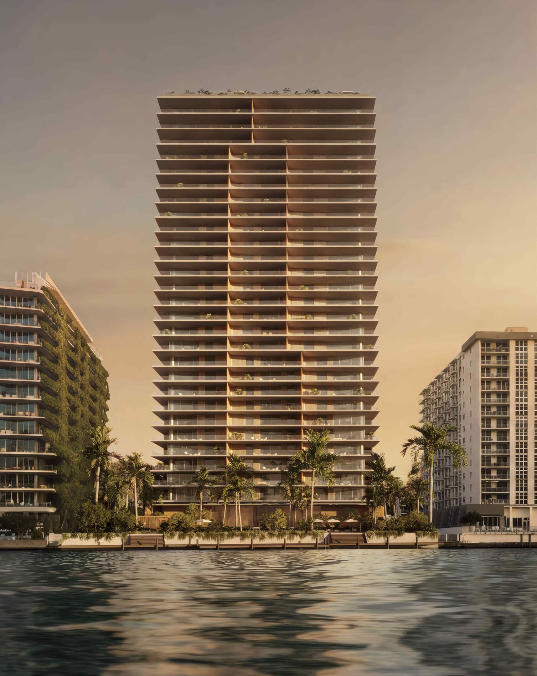 Waterfront view of 1250 West Avenue Residences at dusk, with stacked balconies and palm trees.