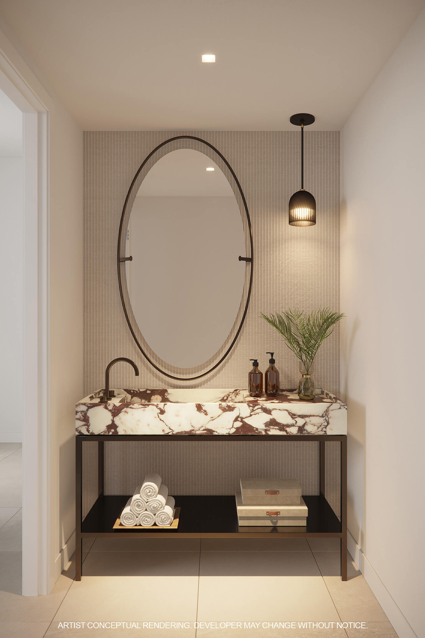 Elegant powder room at 2200 Brickell Residences with a marble vanity and oval mirror