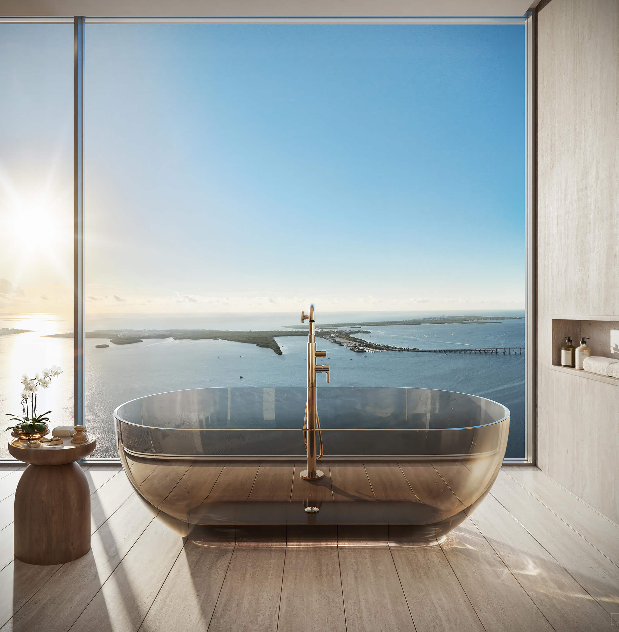Freestanding bathtub at 619 Brickell Residences with floor-to-ceiling windows and panoramic Biscayne Bay view