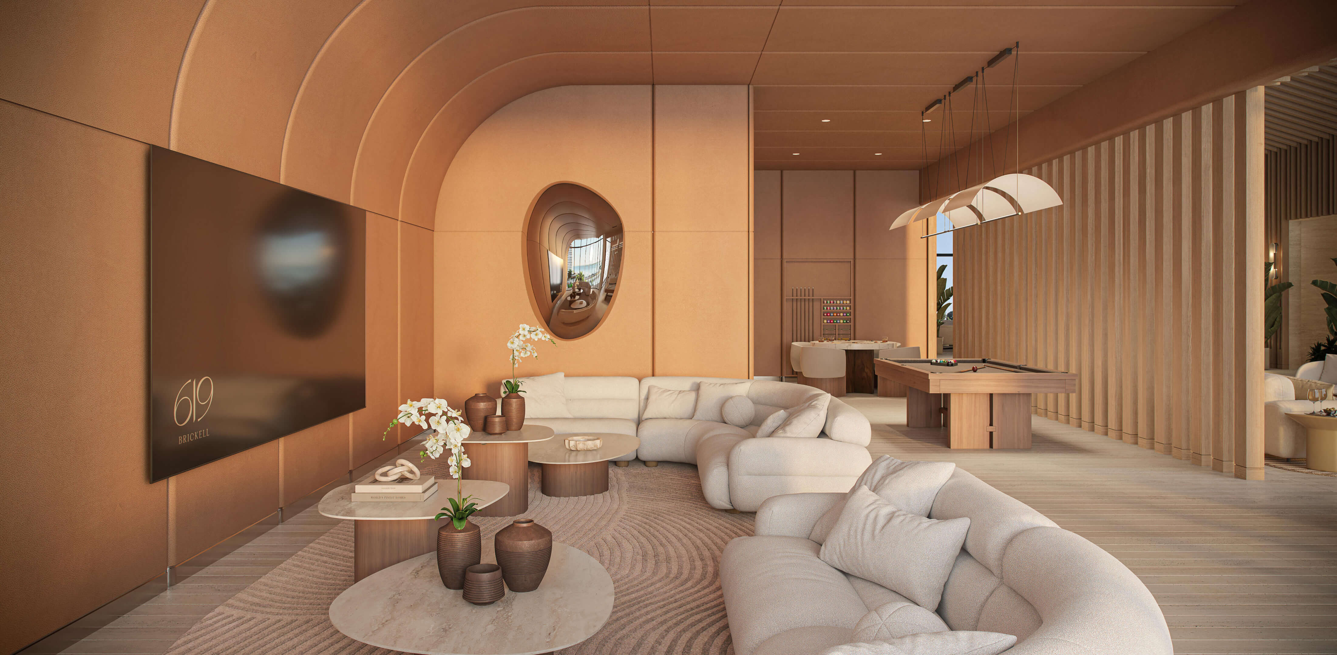 Game lounge and media room at 619 Brickell Residences with billiards table, curved walls, and contemporary seating