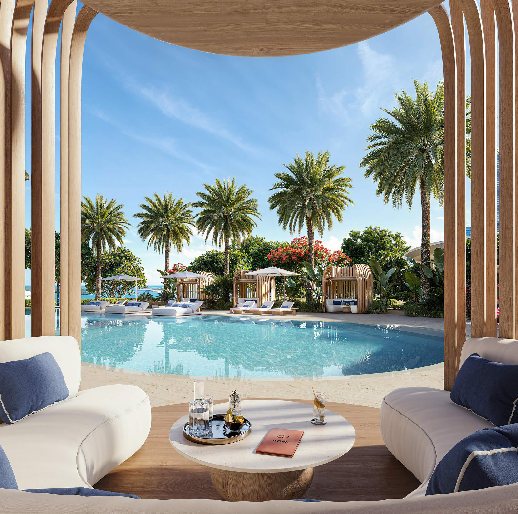 Pool cabanas at 619 Brickell Residences with palm trees, lounge chairs, and resort-style outdoor amenities