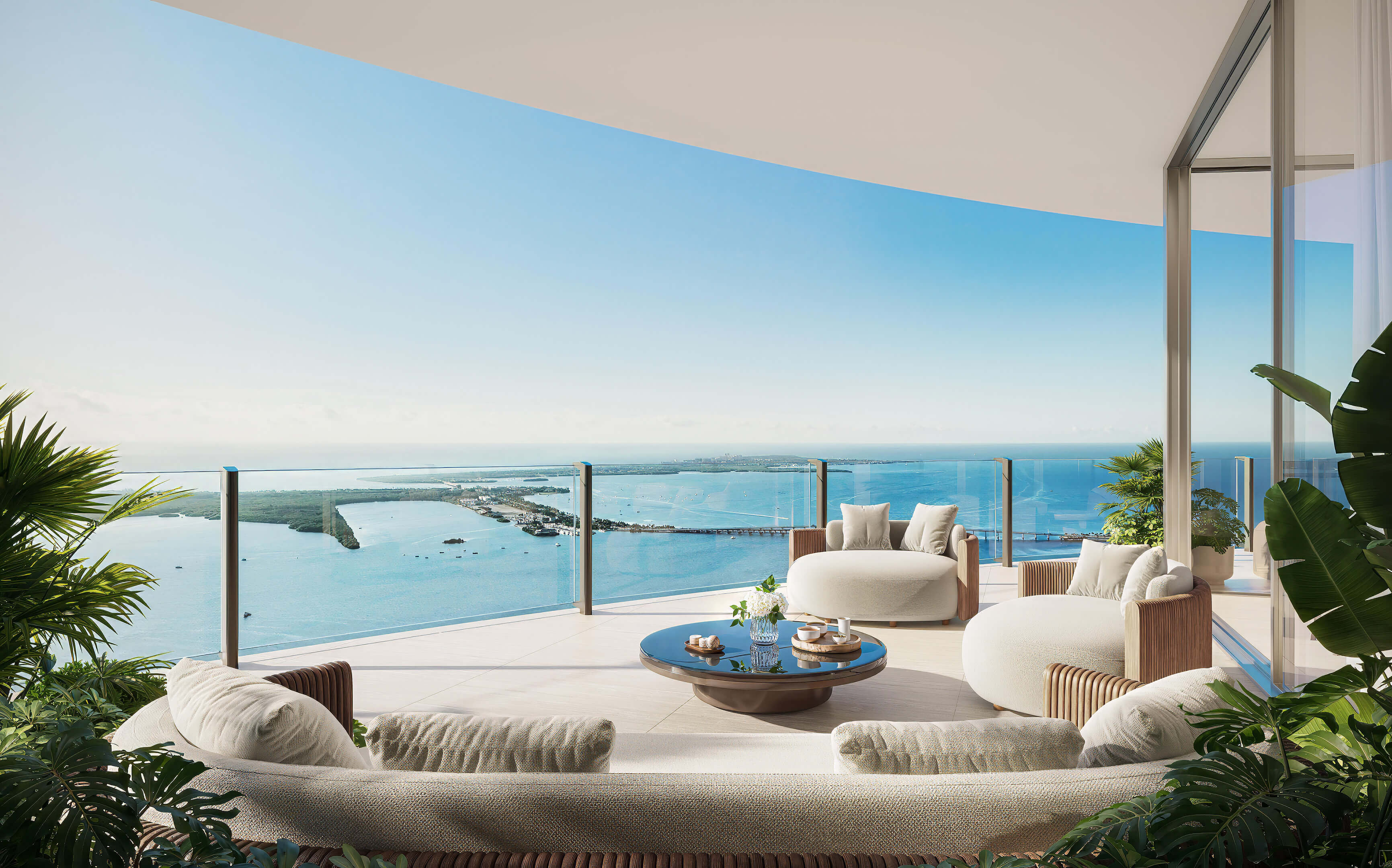 Private terrace at 619 Brickell Residences with outdoor seating and panoramic Biscayne Bay views