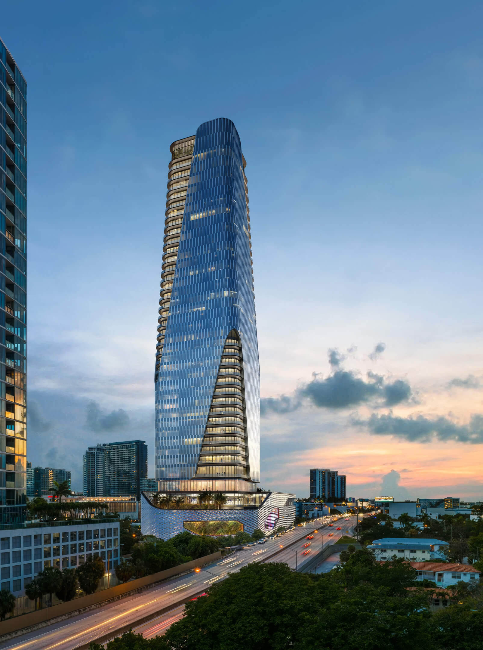 Anantara Resort & Residences glass tower evening view with illuminated modern facade