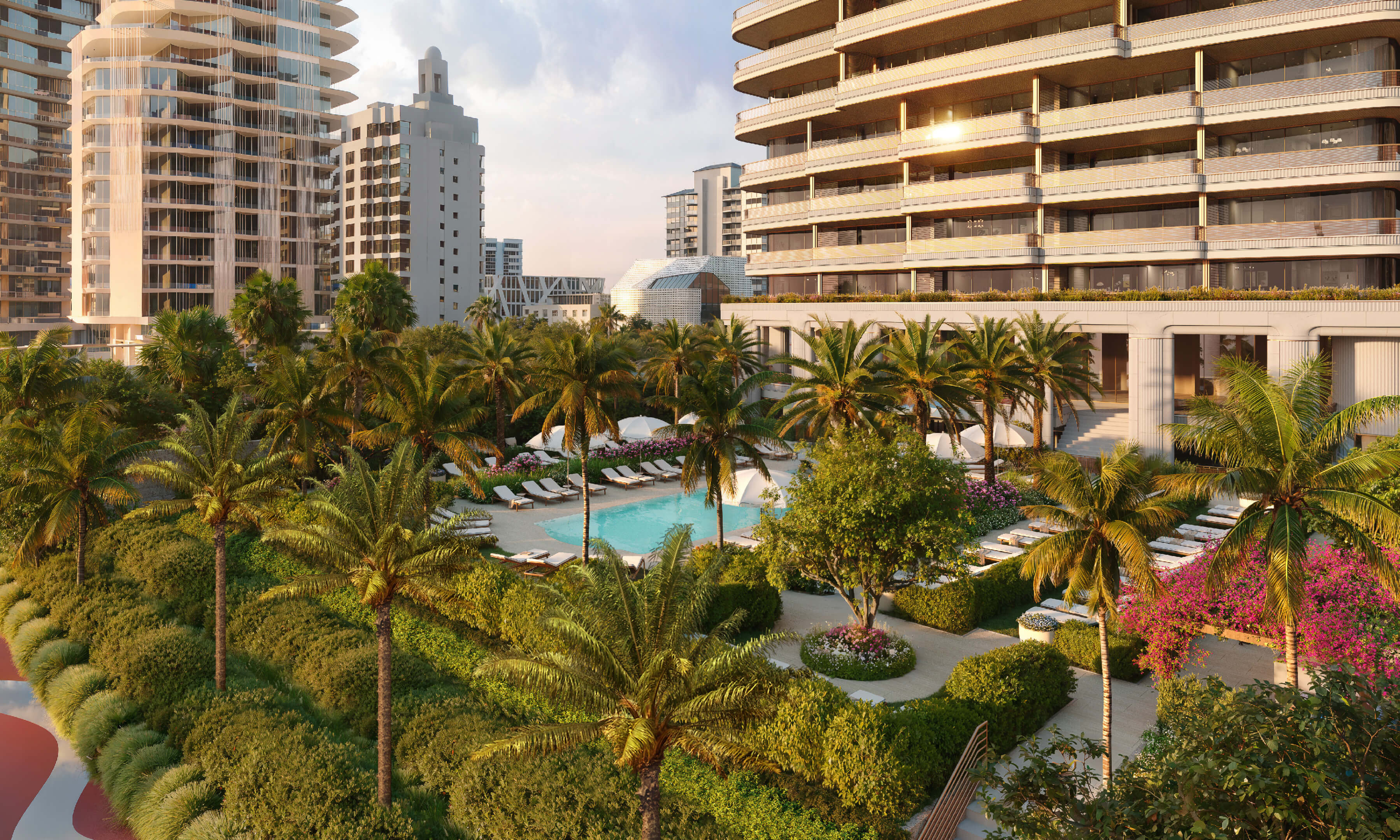 Lush garden and pool view at Casa Cipriani Miami Beach surrounded by tropical greenery.