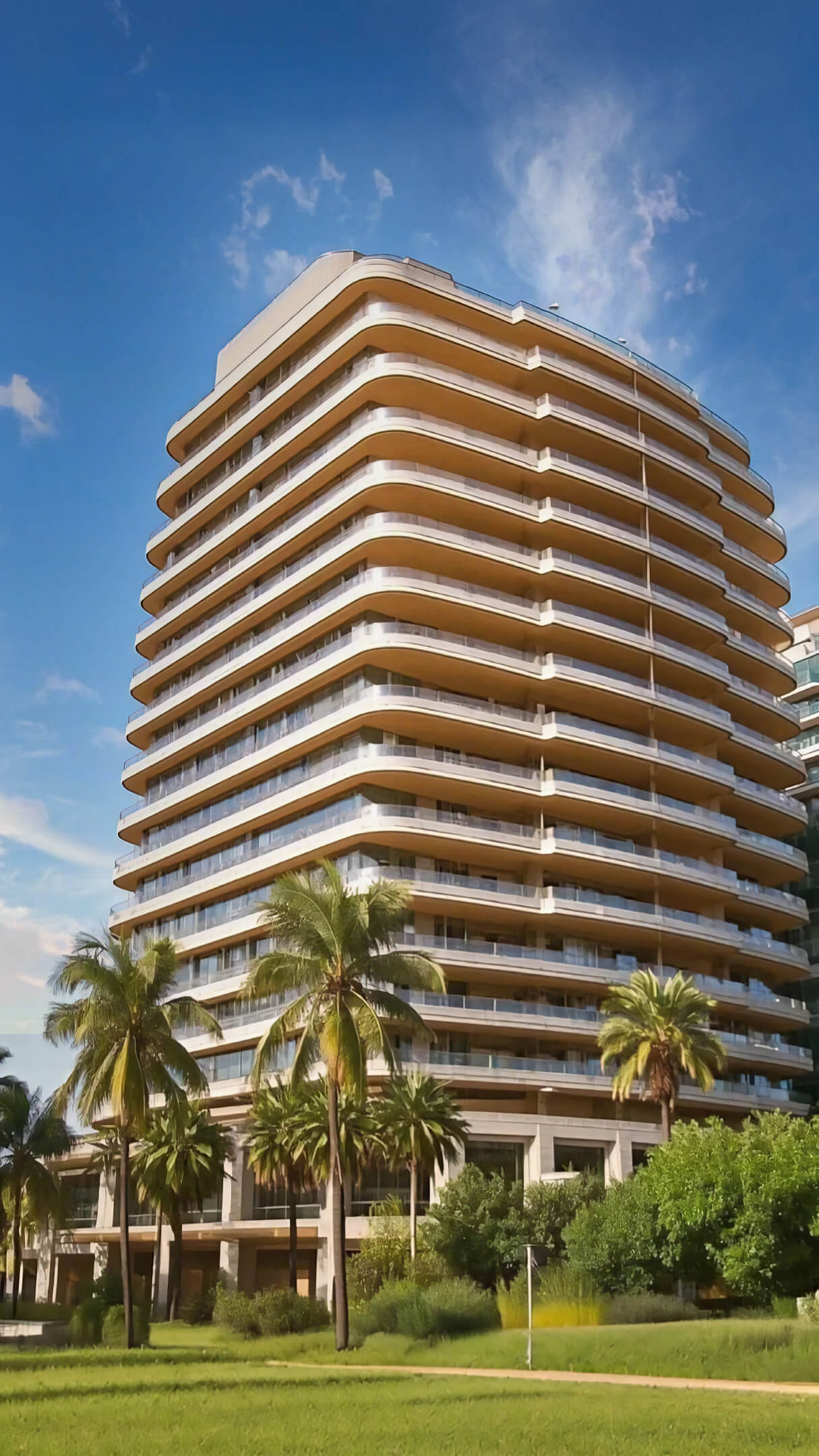 Angled side view of Casa Cipriani Miami Beach under a blue sky with palm trees.