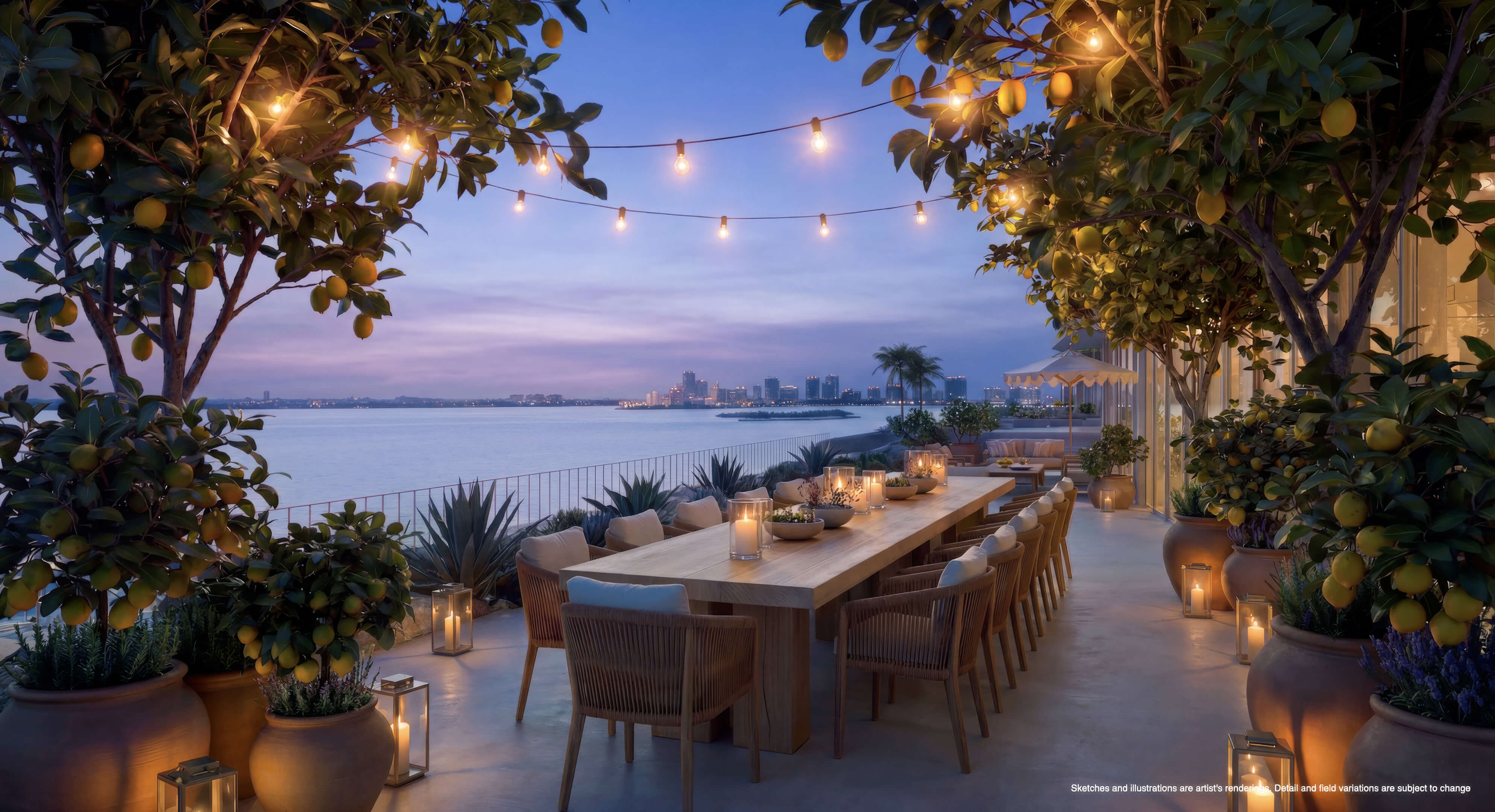 Waterfront dining terrace at Continuum 12000 North Miami with illuminated lemon trees and evening bay views