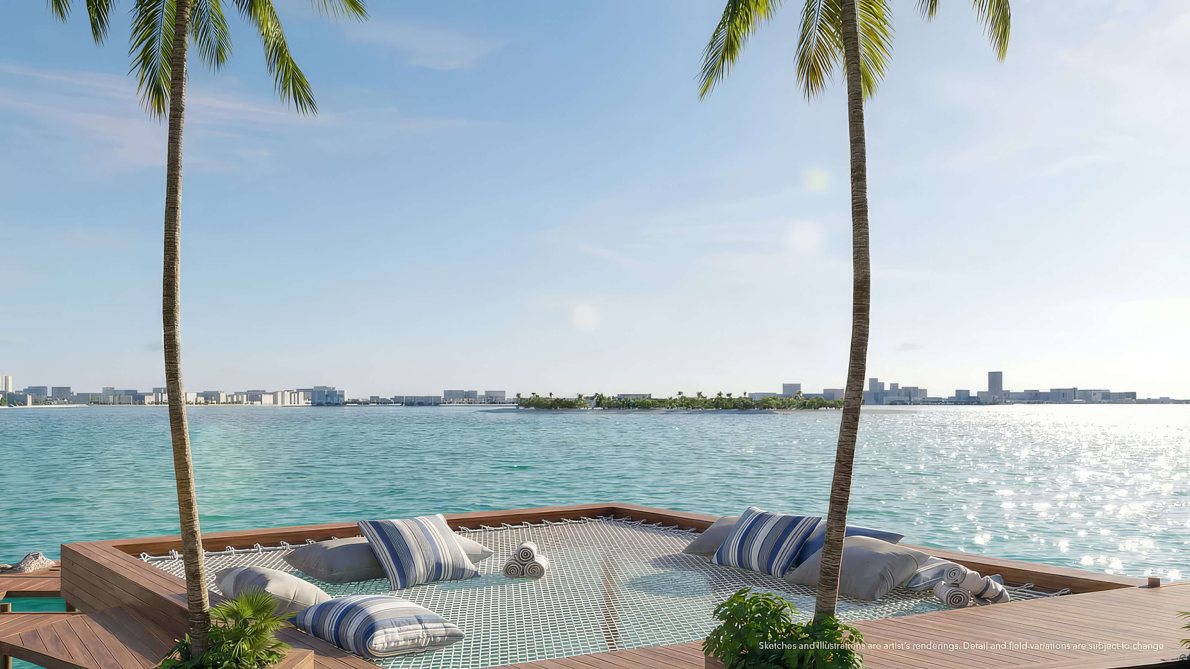 Waterfront net lounge at Continuum 12000 North Miami with palm trees and relaxing bay views