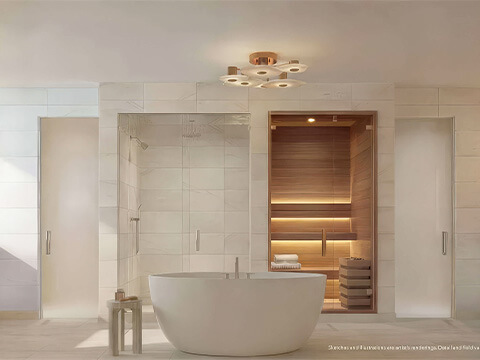Luxury bathroom at Continuum 12000 North Miami with freestanding bathtub and illuminated private sauna