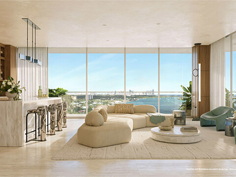 Luxury living room at Continuum 12000 North Miami with open kitchen and panoramic water views