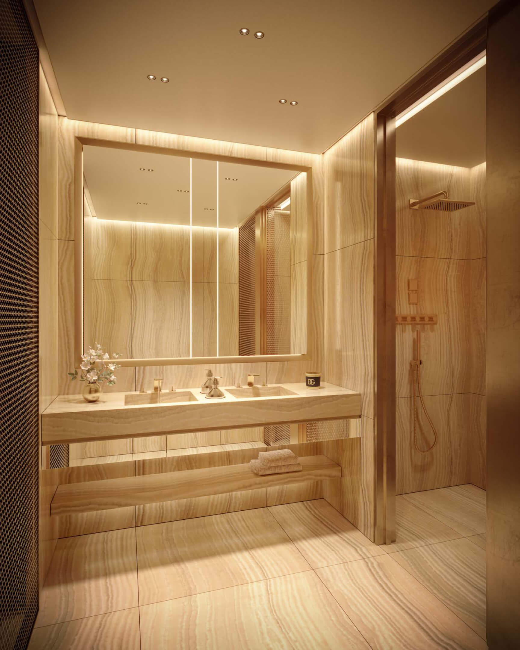 Golden marble bathroom suite at 888 Brickell Ave with elegant lighting and rainfall shower