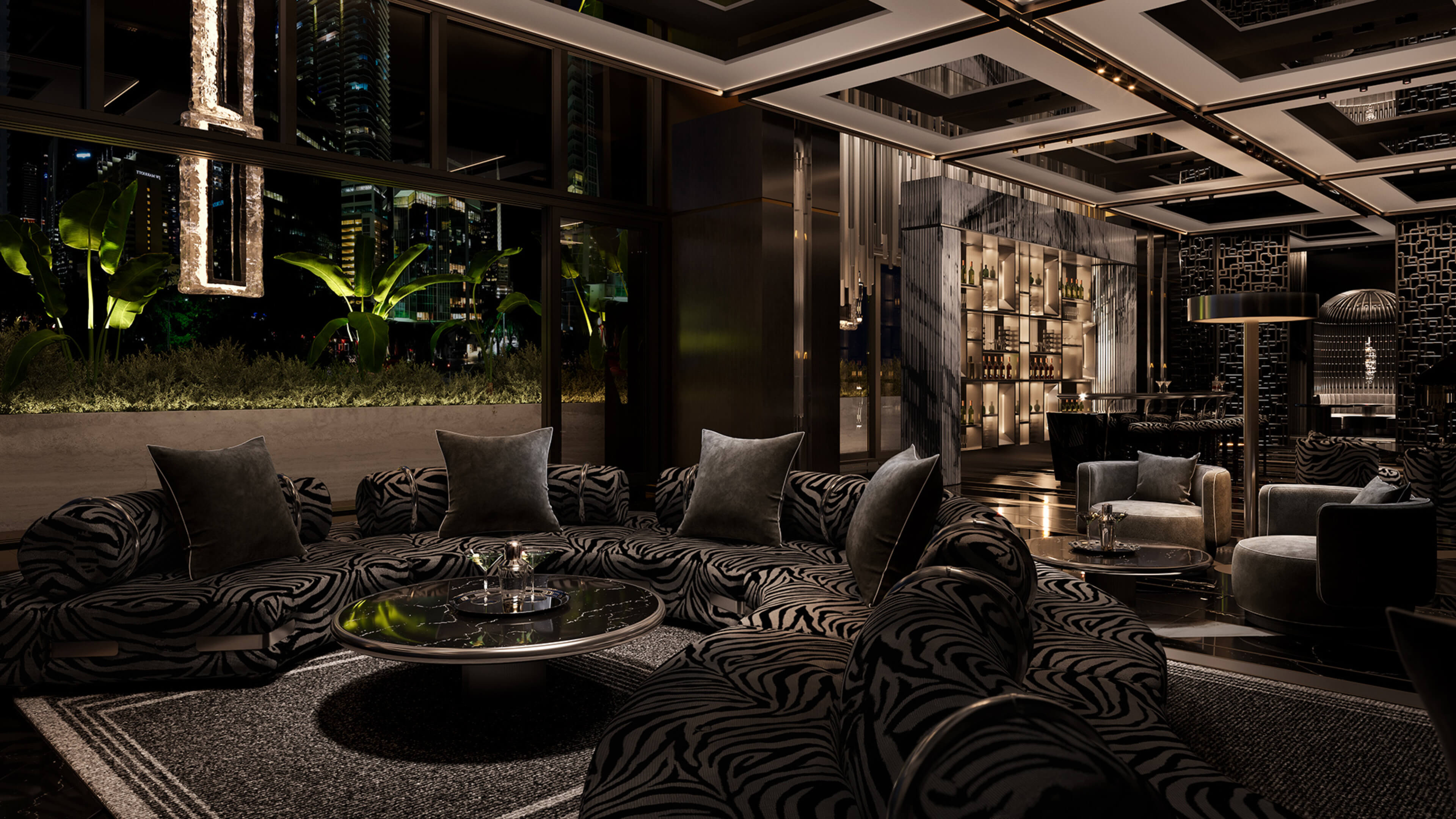 Zebra-print luxury lounge at 888 Brickell Ave with bar and nighttime skyline reflections