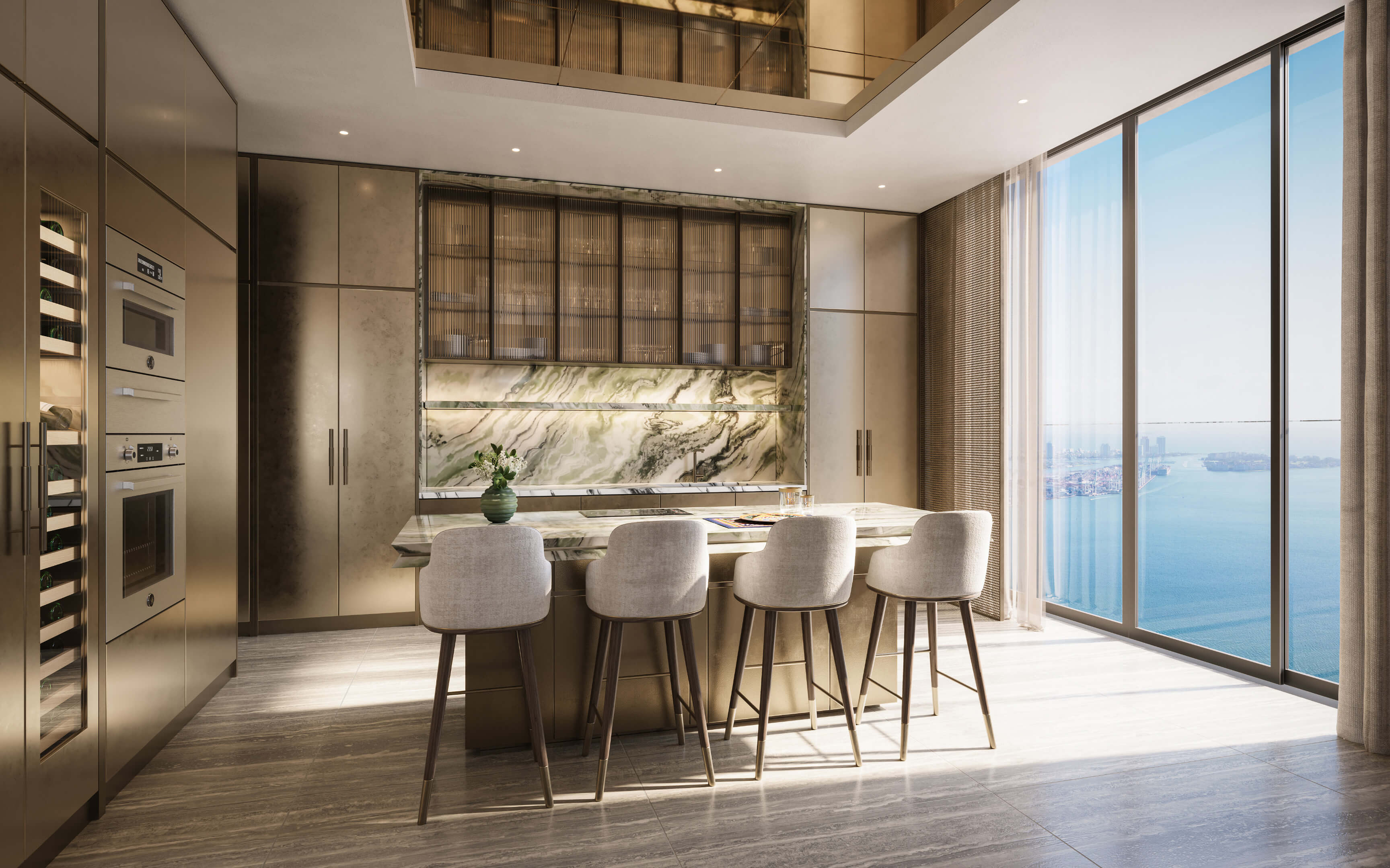 Bright kitchen design at Dolce & Gabbana Residences featuring marble and expansive bay view