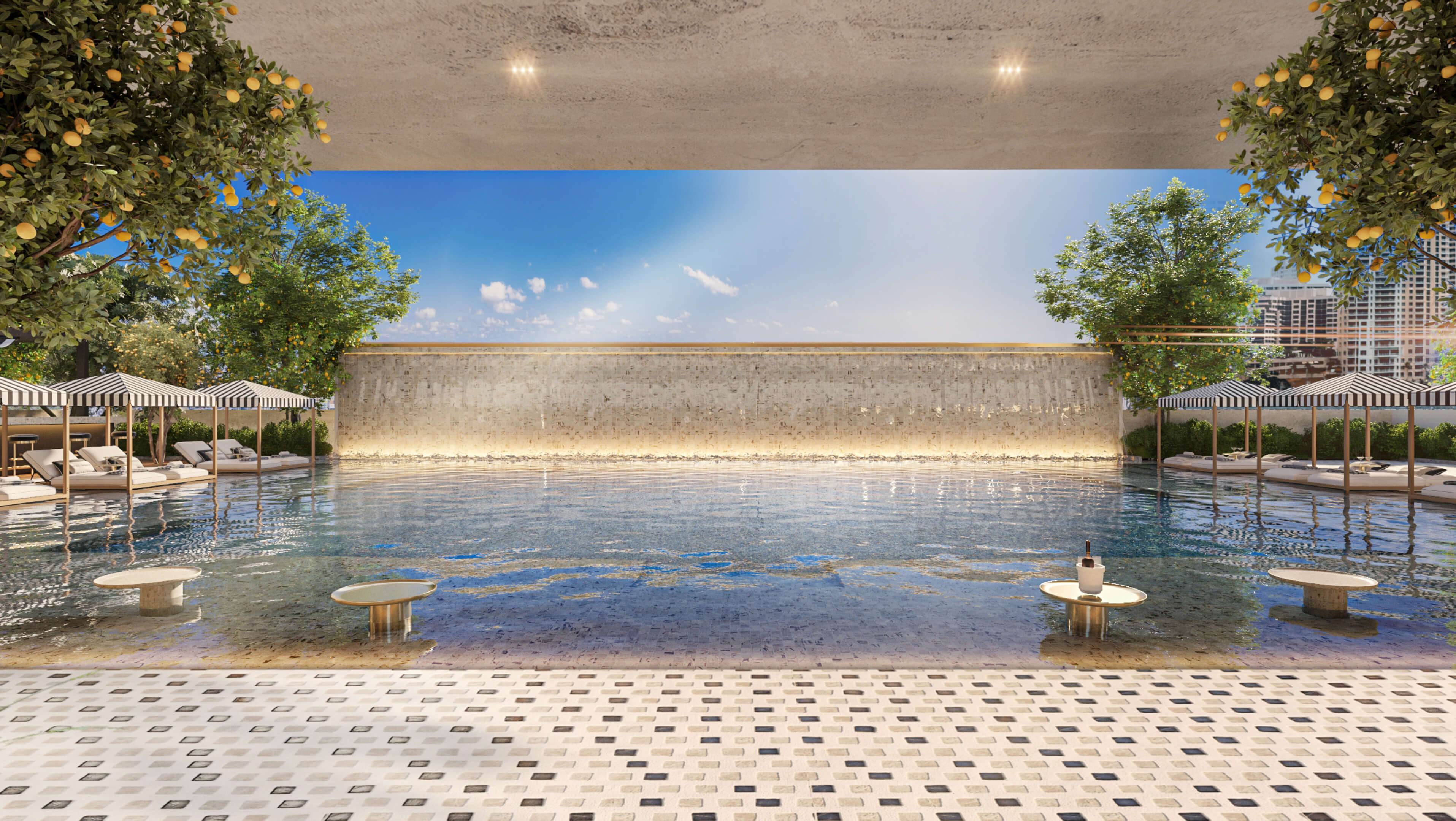 Luxury outdoor pool at Dolce & Gabbana Residences with waterfall wall and striped cabanas