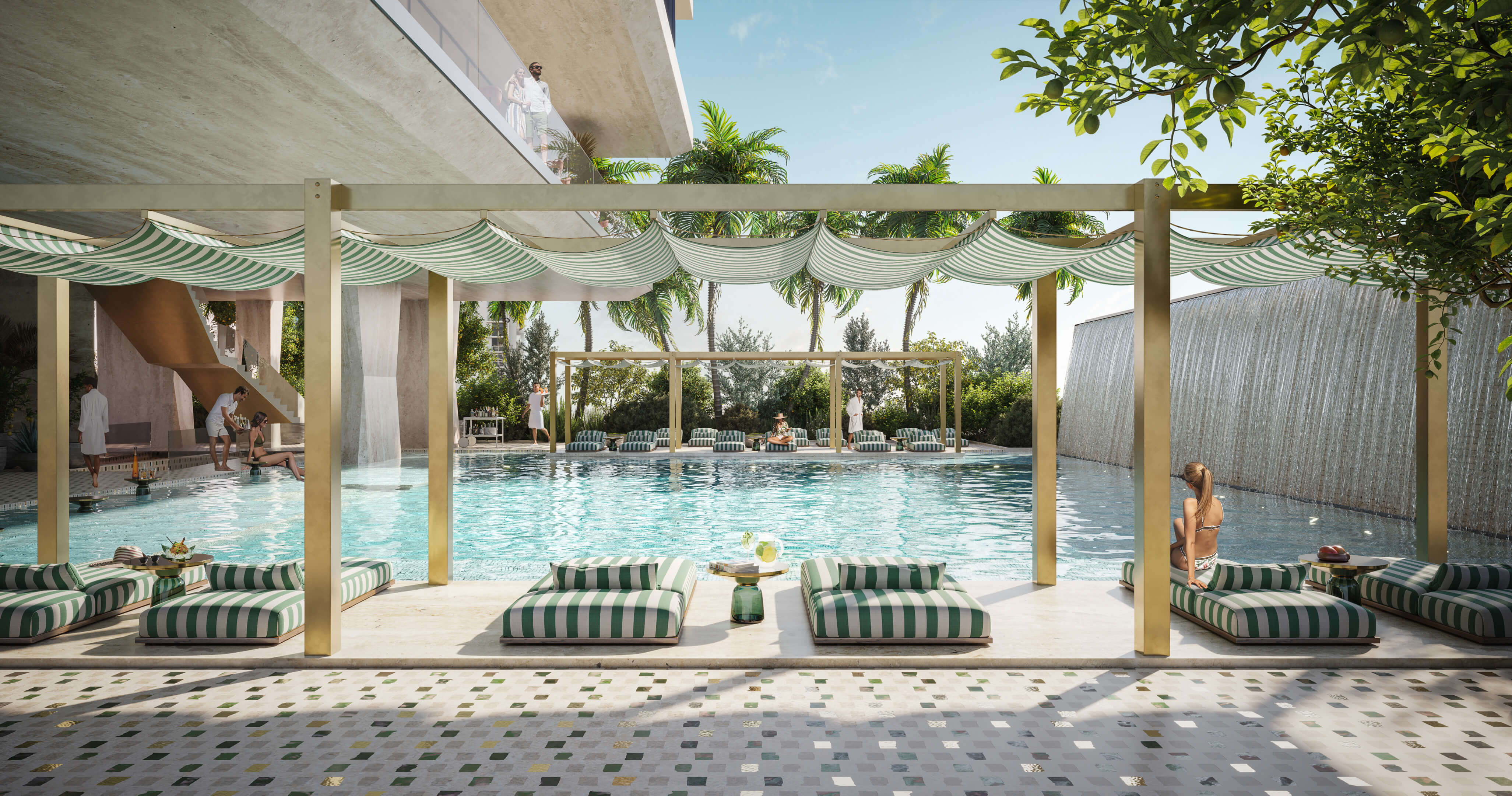 Poolside striped cabanas with waterfall backdrop at Dolce & Gabbana Residences in Miami