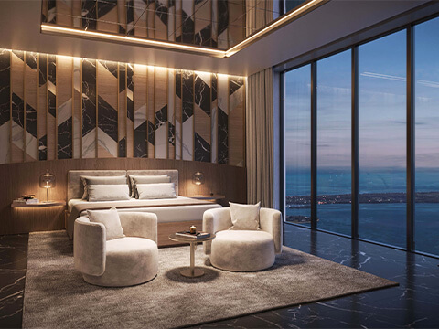 Primary bedroom with night view at 888 Brickell Dolce & Gabbana Residences