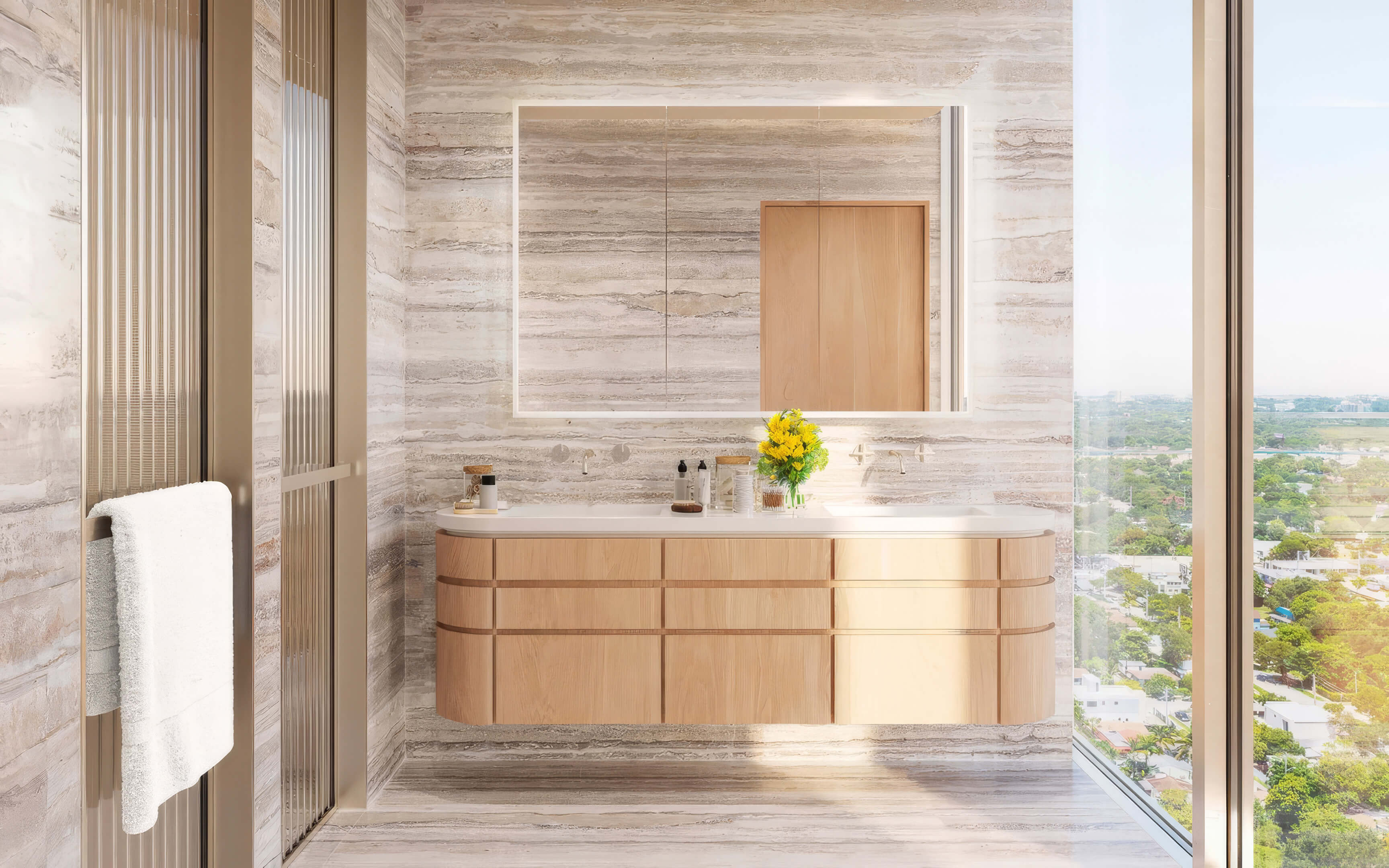 Bathroom with a floating double vanity and a tall window overlooking the neighborhood at Fouquet’s Hotel & Residences