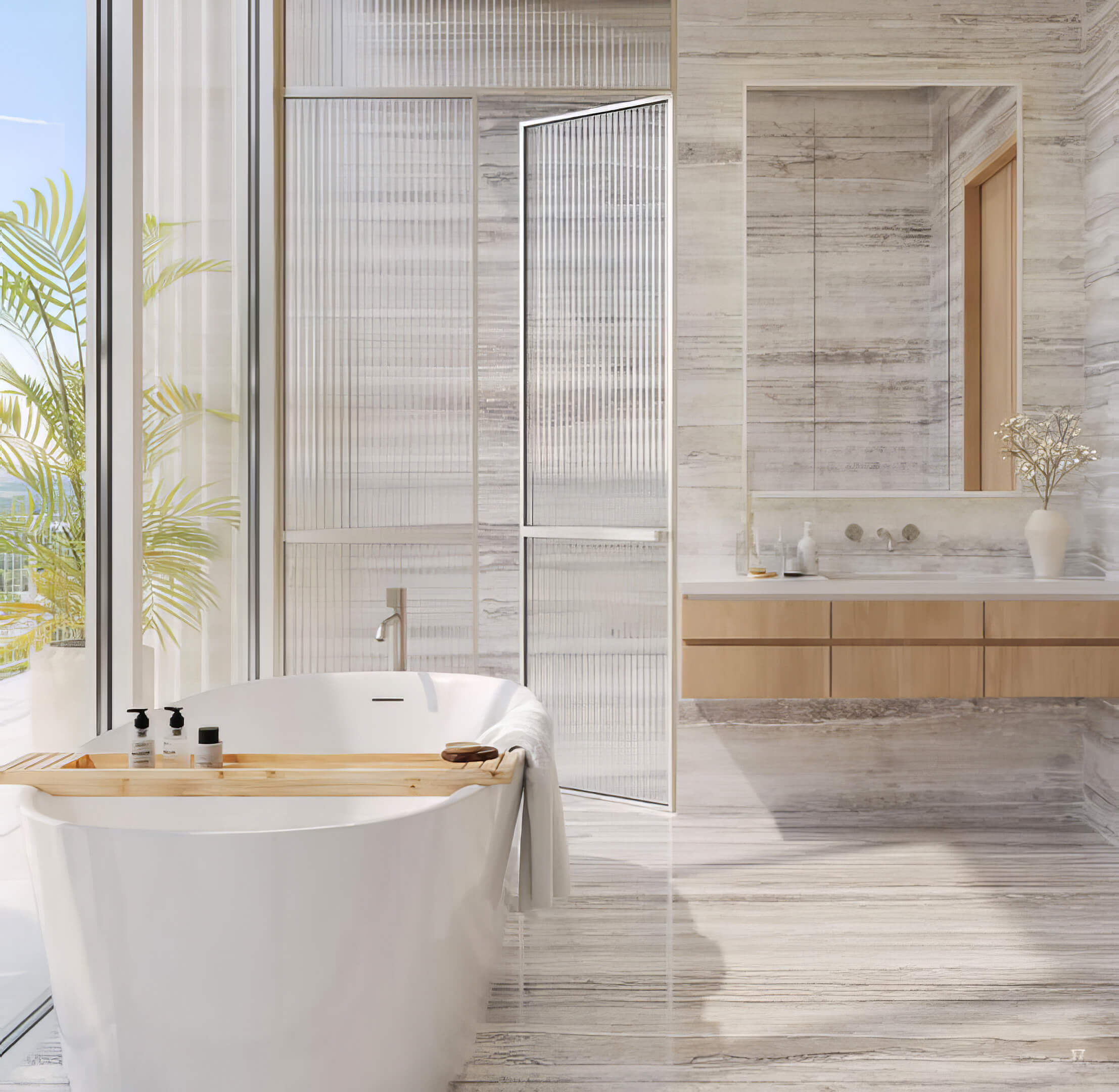 Bathroom with a freestanding bathtub, glass shower enclosure, and wood vanity at Fouquet’s Hotel & Residences