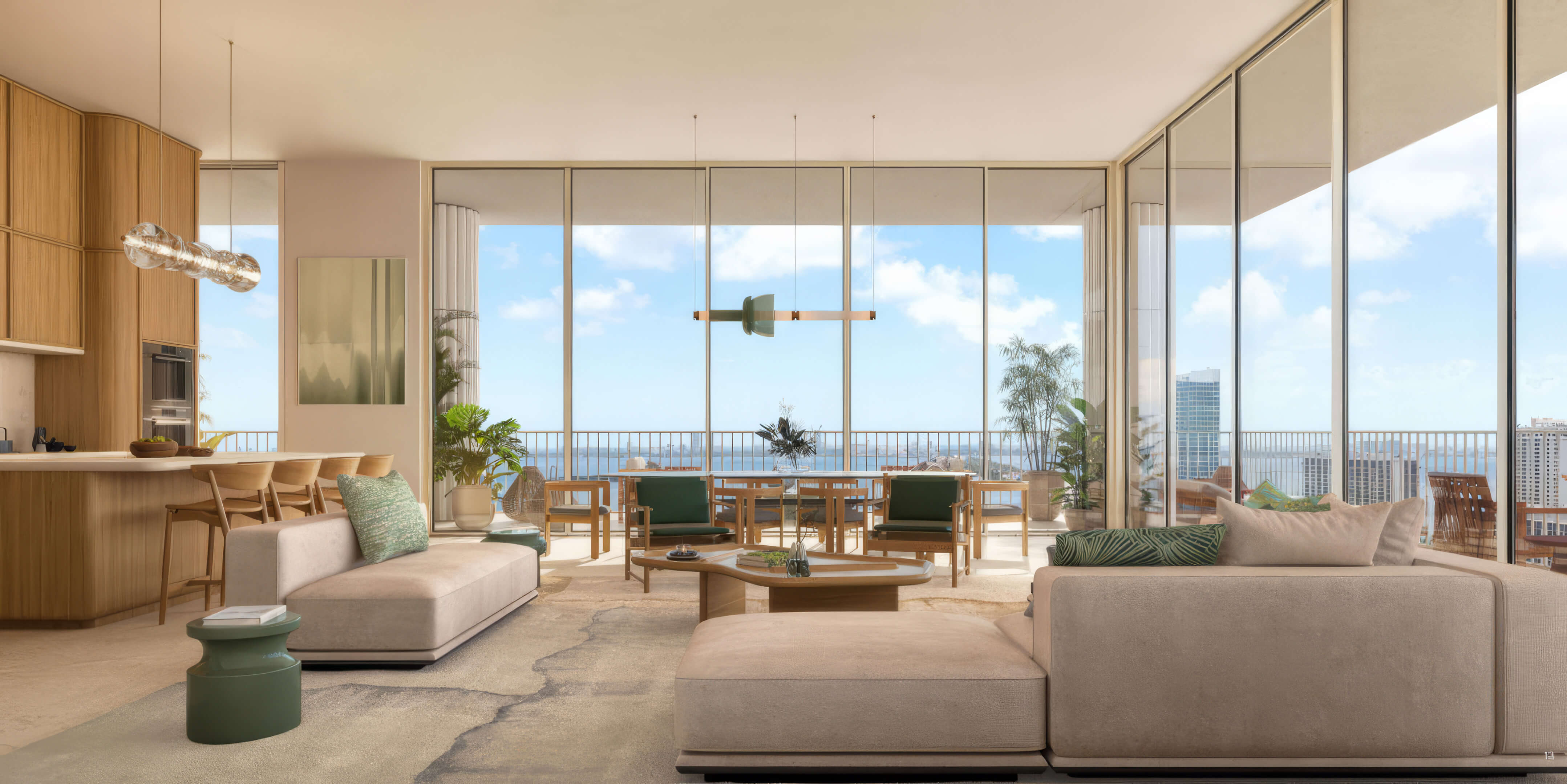 Living room with an open kitchen and dining area facing a furnished terrace at Fouquet’s Hotel & Residences