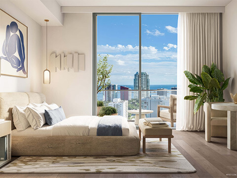 Bedroom suite at House of Wellness Brickell with floor-to-ceiling windows, soft neutral design, and ocean view