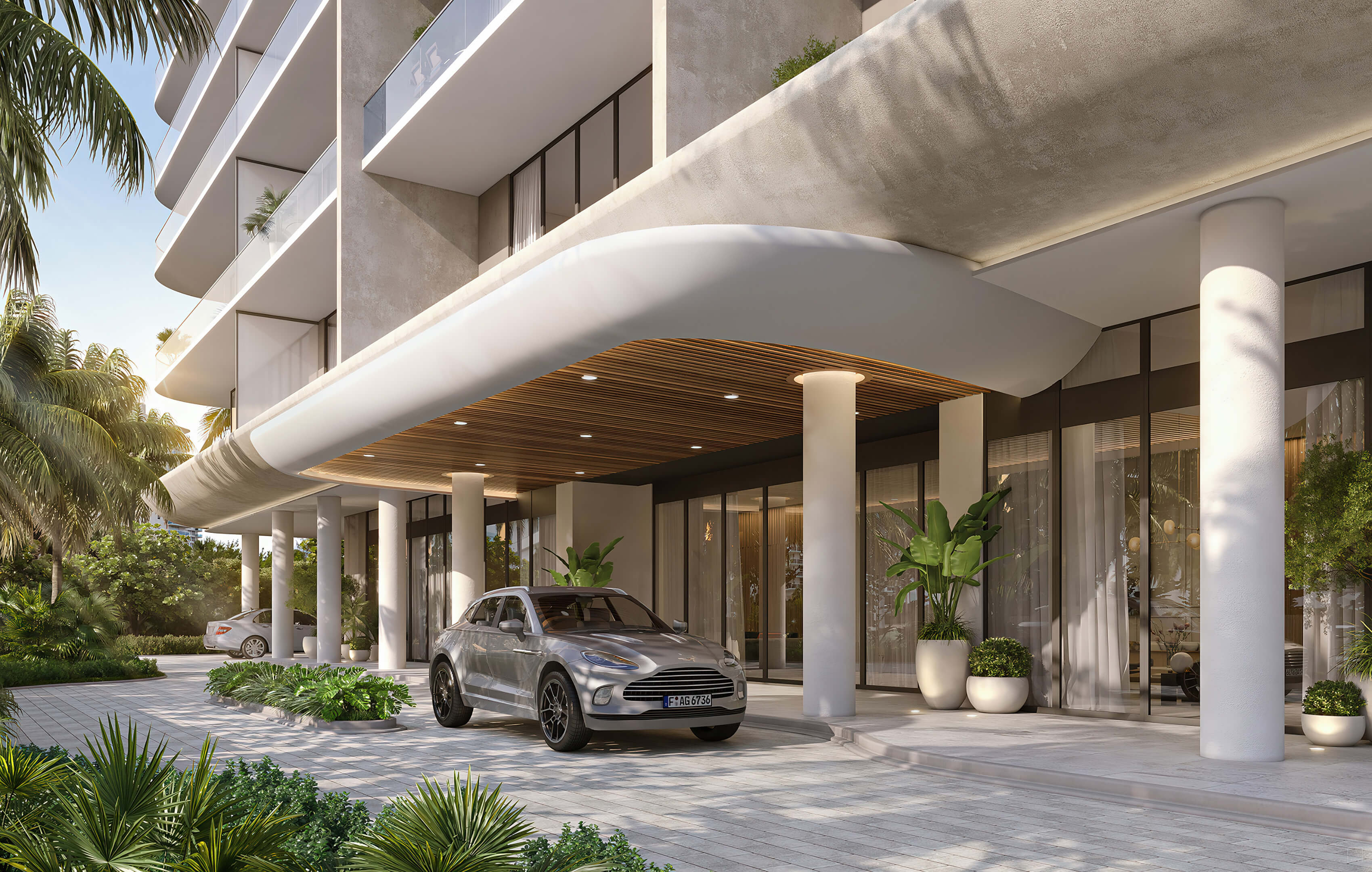Icon Beach Residences entrance with lush landscaping