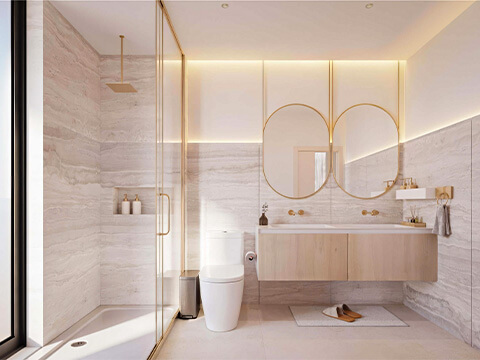 Luxury bathroom at LEV Residences Aventura Miami with double vanity, glass shower and elegant stone finishes
