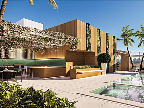 Rooftop pool deck at LEV Residences Aventura Miami with lounge seating, outdoor kitchen and skyline views