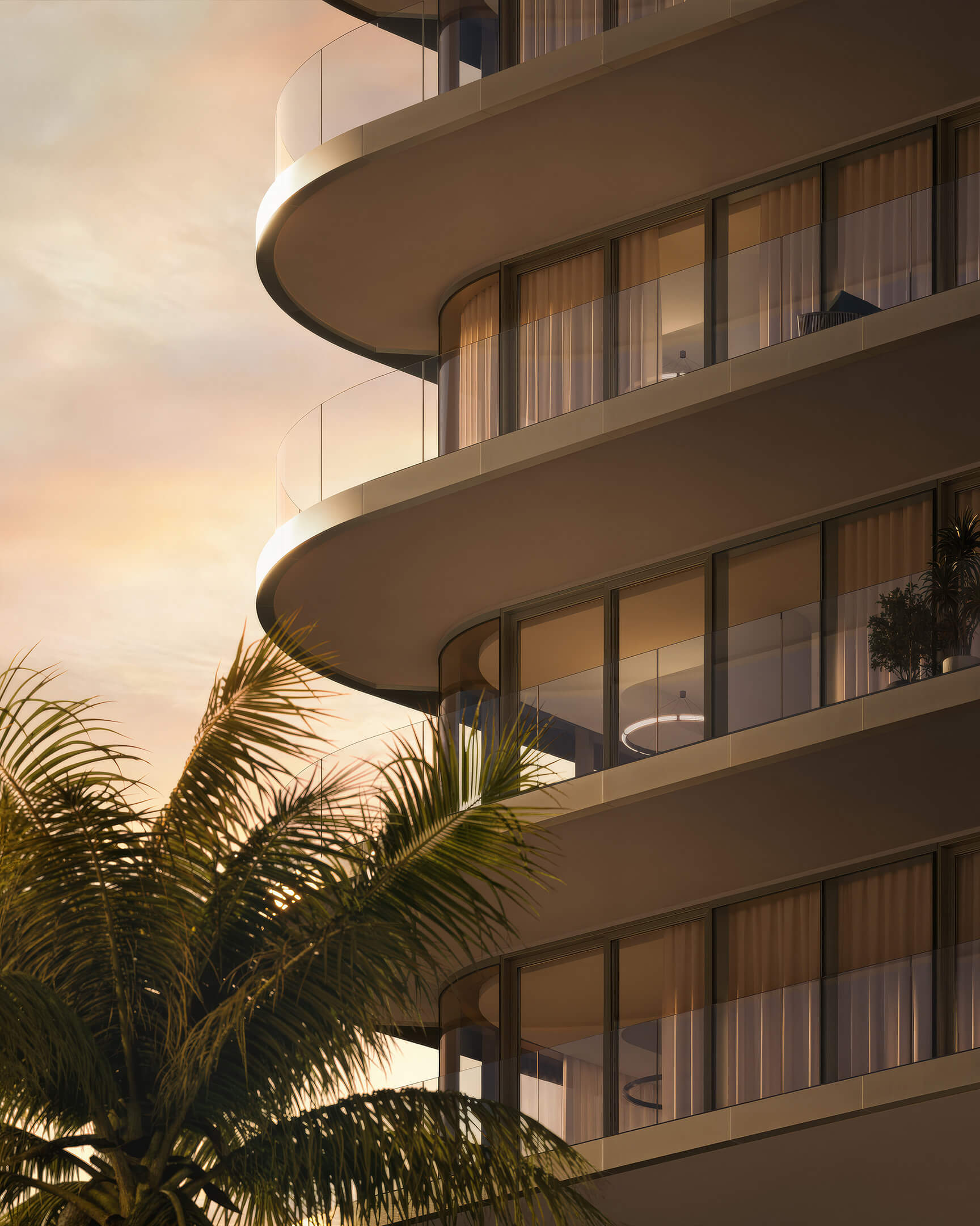 Curved balcony detail at Lilli Miami Edgewater with glass railings and warm sunset light