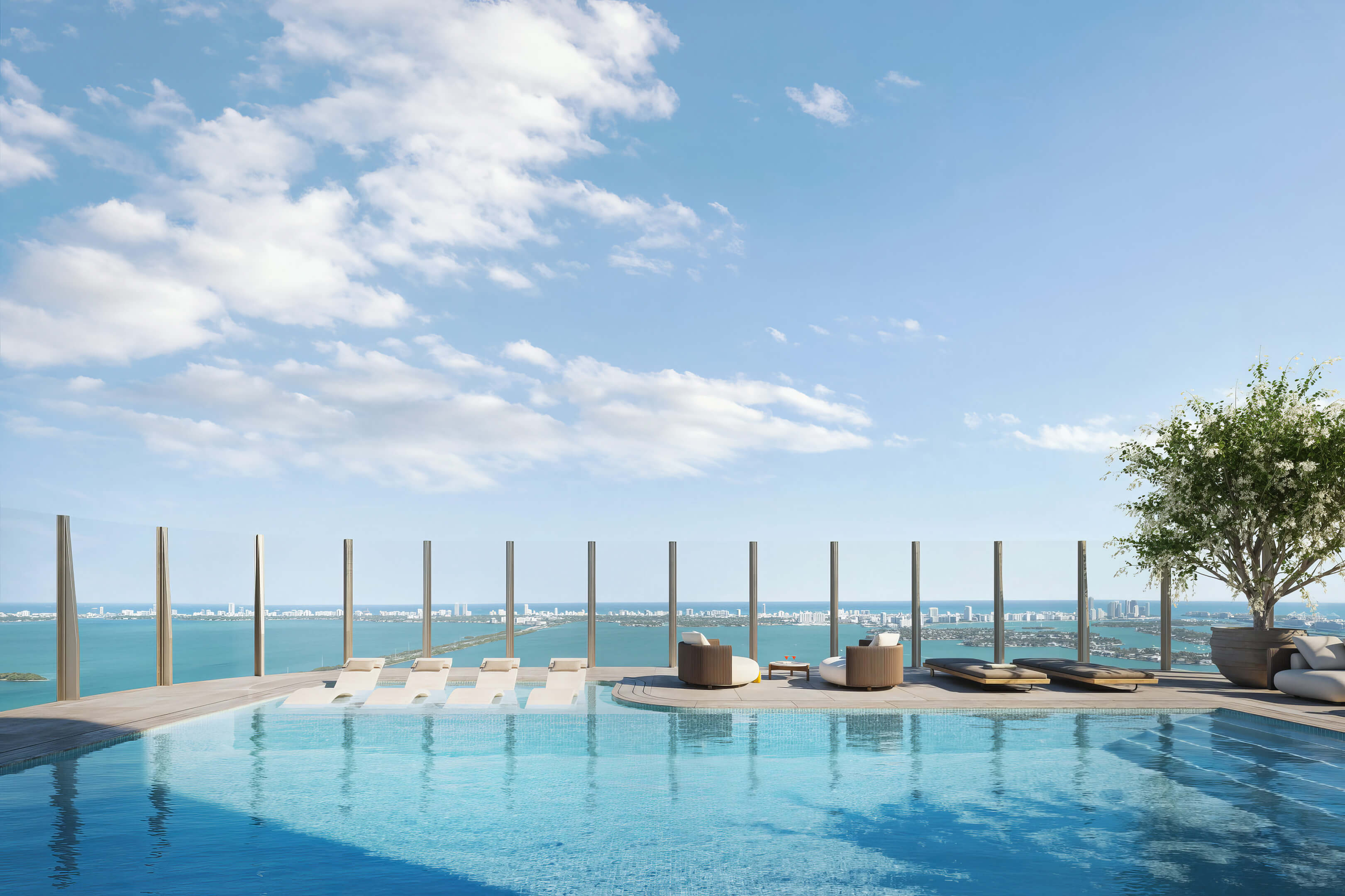 Rooftop pool at Lilli Miami Edgewater with lounge chairs and panoramic ocean and skyline views