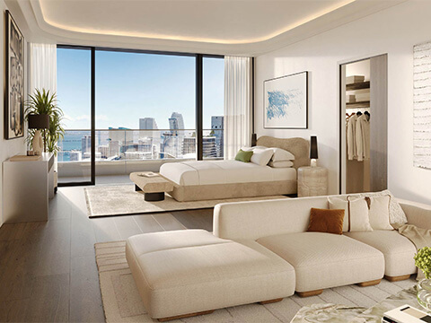 Mercedes Benz Places Miami luxury primary bedroom with contemporary furnishings and panoramic city views