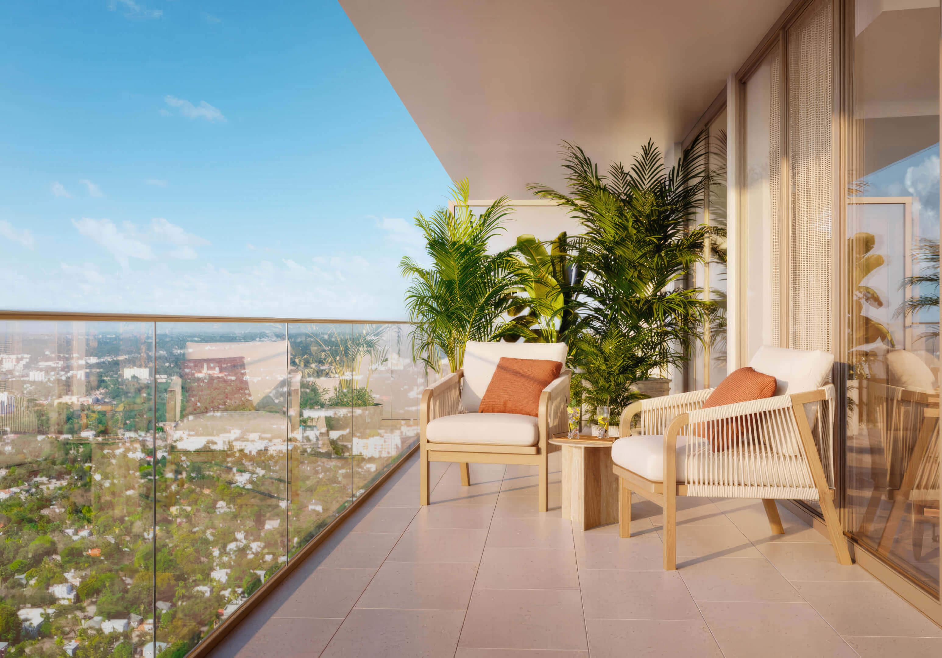 Balcony with tropical greenery and stunning city views at Miami Tropic Residences