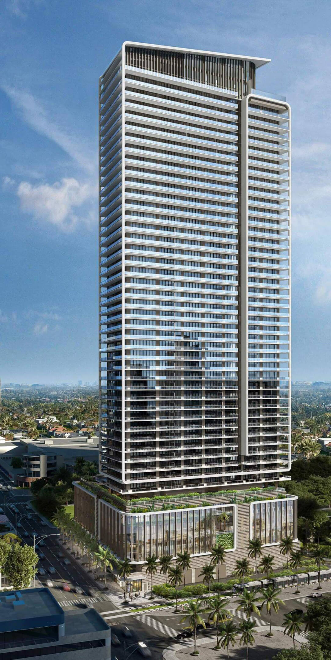 Daytime aerial perspective of Miami Tropic Residences modern glass tower