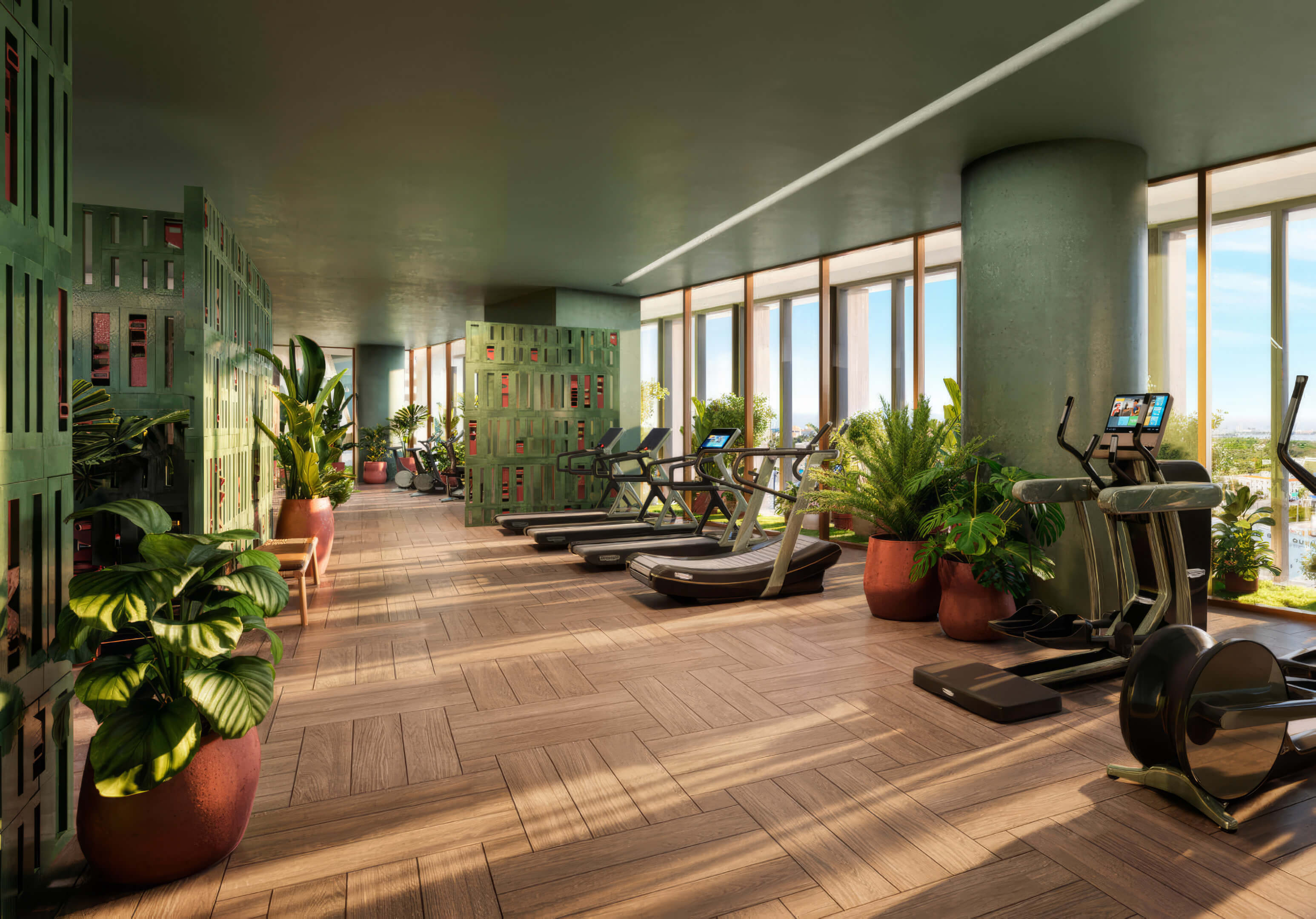 State-of-the-art fitness center with greenery and bay views at Miami Tropic Residences