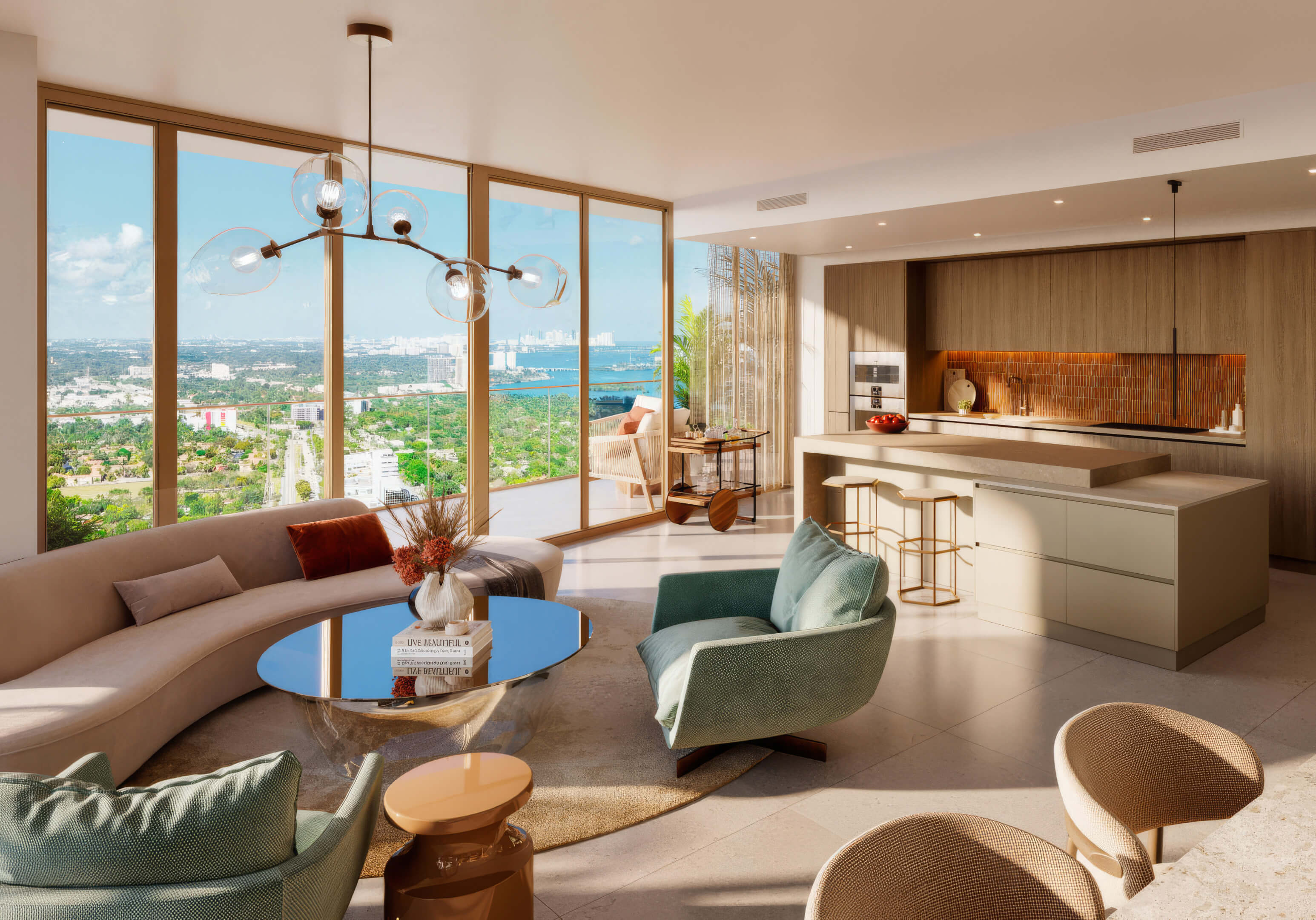 Open concept living room and designer kitchen with bay views at Miami Tropic Residences