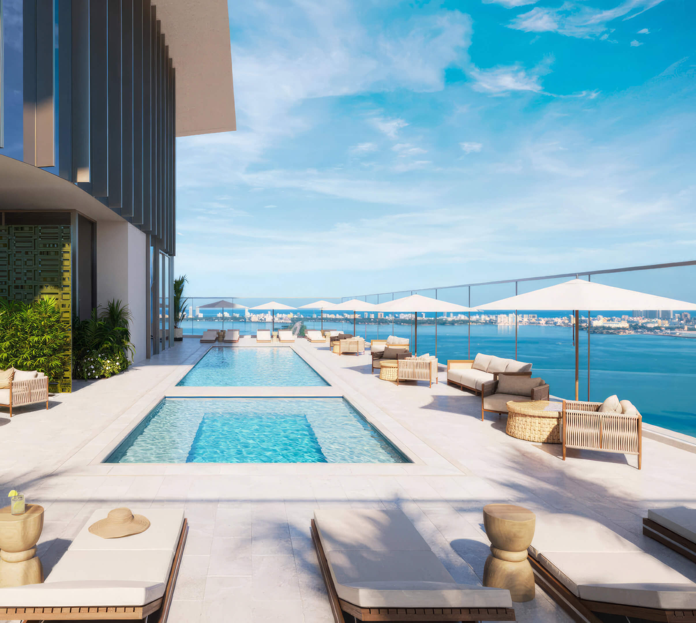 Rooftop pool with panoramic bay views at Miami Tropic Residences