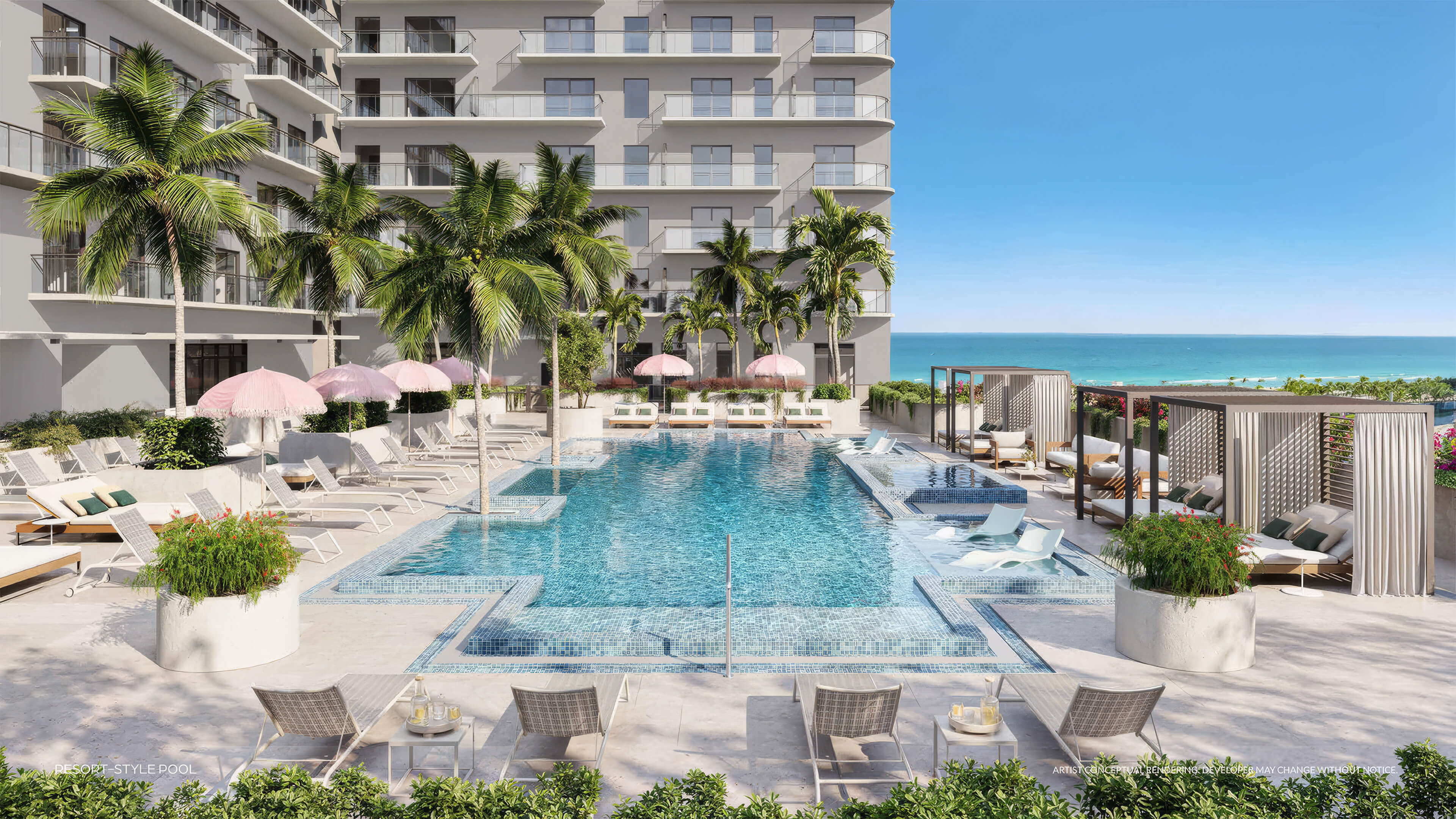 Resort style pool at NoBe Parc Miami Beach with ocean views, lounge chairs and tropical landscaping
