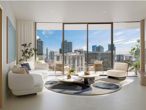 Bright living room at One Twenty Brickell Signature Residences with floor-to-ceiling windows and skyline views