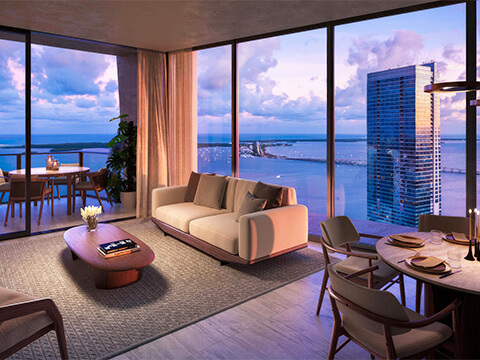 Bayfront living and dining room at Ora by Casa Tua Miami with panoramic water views