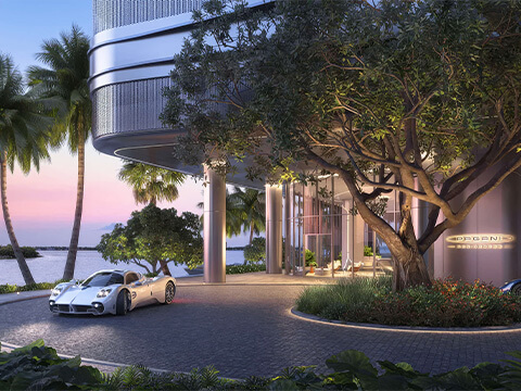 Arrival entrance palm court at Pagani Residences with luxury auto display and elegant waterfront lobby approach
