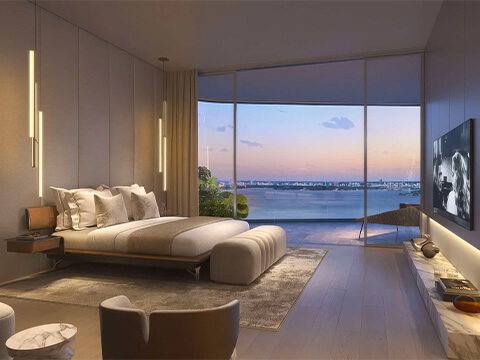Sunset bedroom at Pagani Residences in North Bay Village with floor-to-ceiling glass and tranquil waterfront outlook