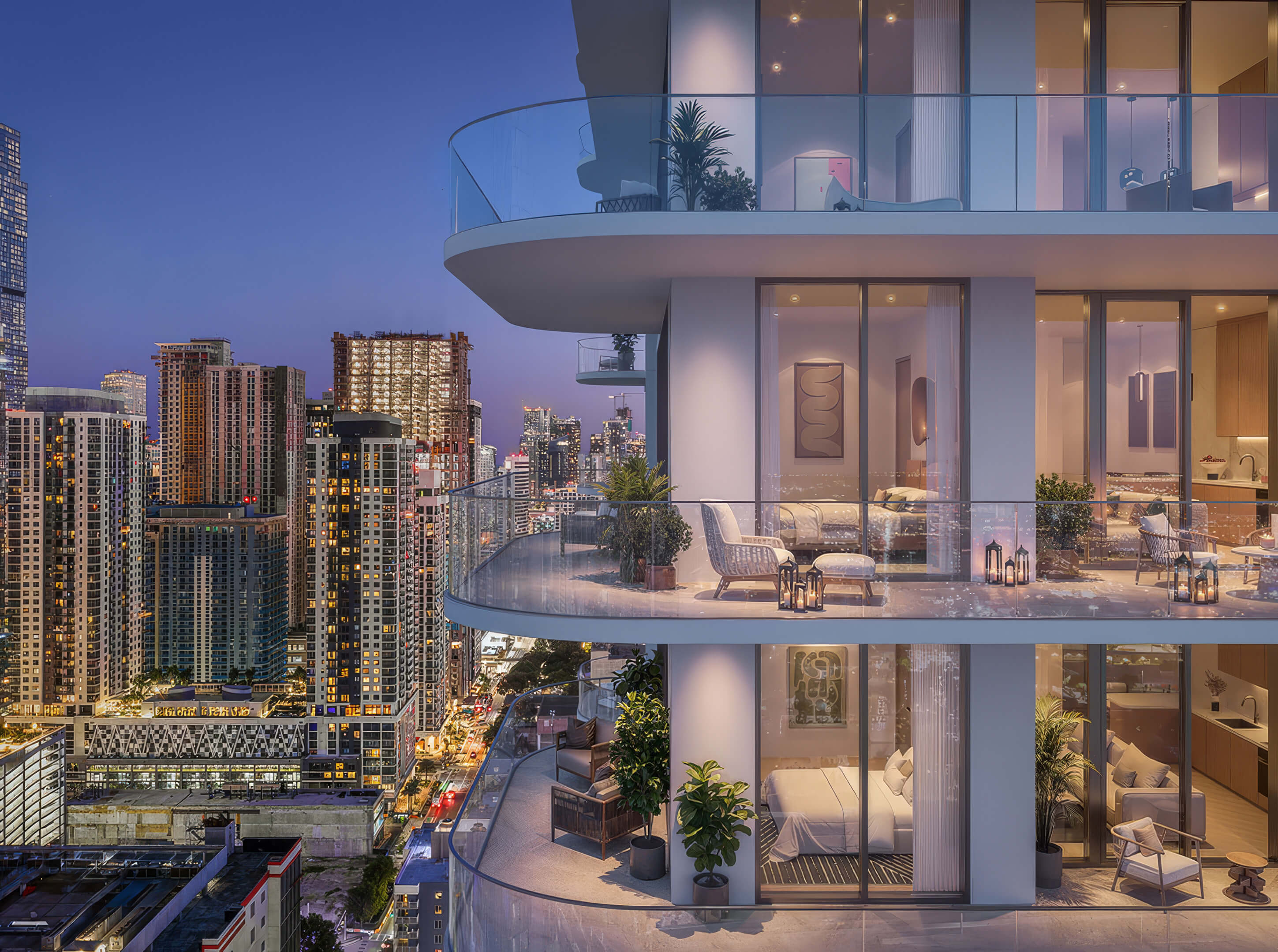 Private balcony at Palm Tree Residences Miami with floor-to-ceiling glass and illuminated city skyline views