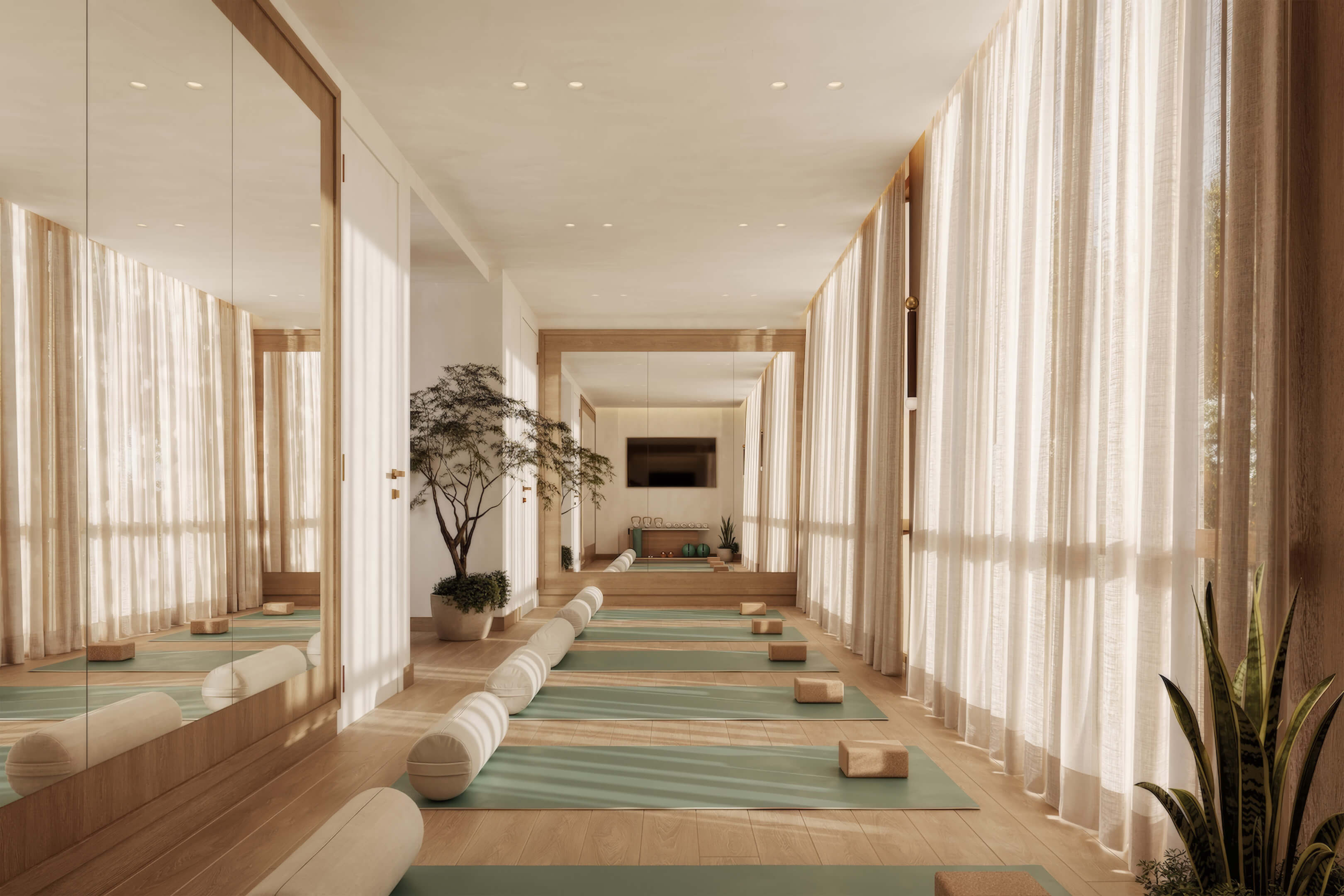 Serene yoga and wellness studio at Ponce Park Residences with natural light