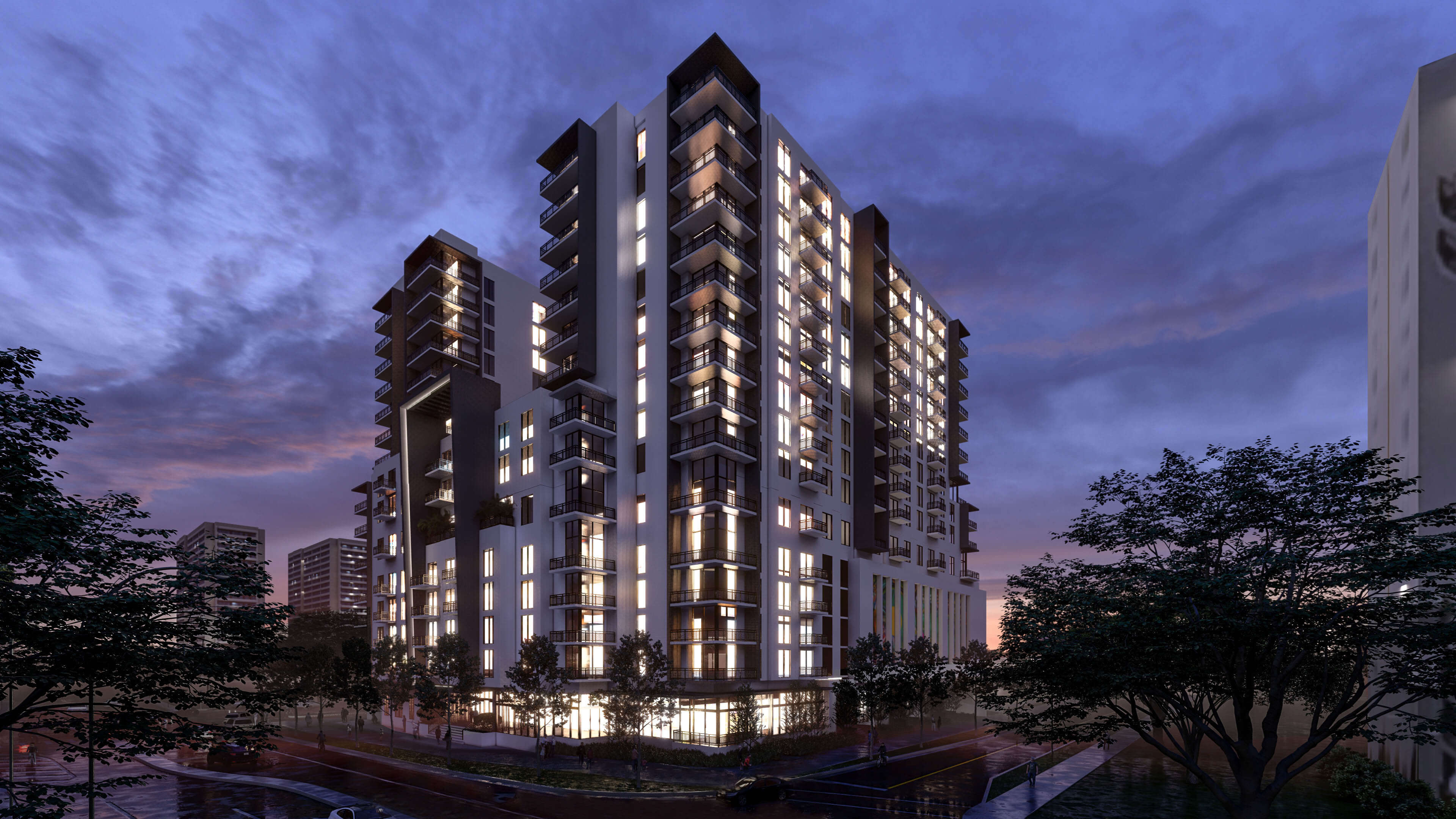River District 14 building illuminated at dusk with elegant lighting and urban ambiance