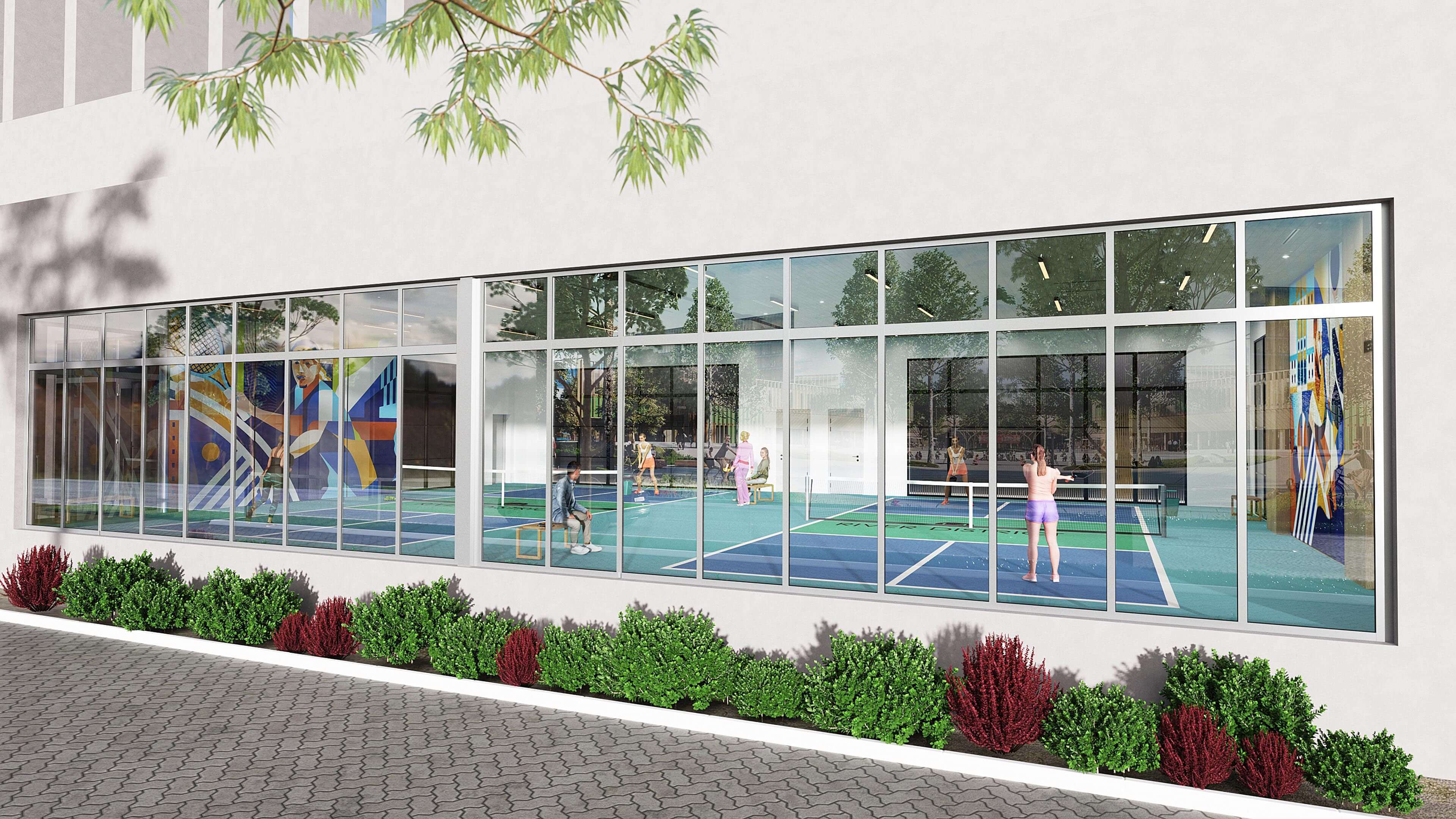 Exterior view of pickleball courts with large windows at River District 14