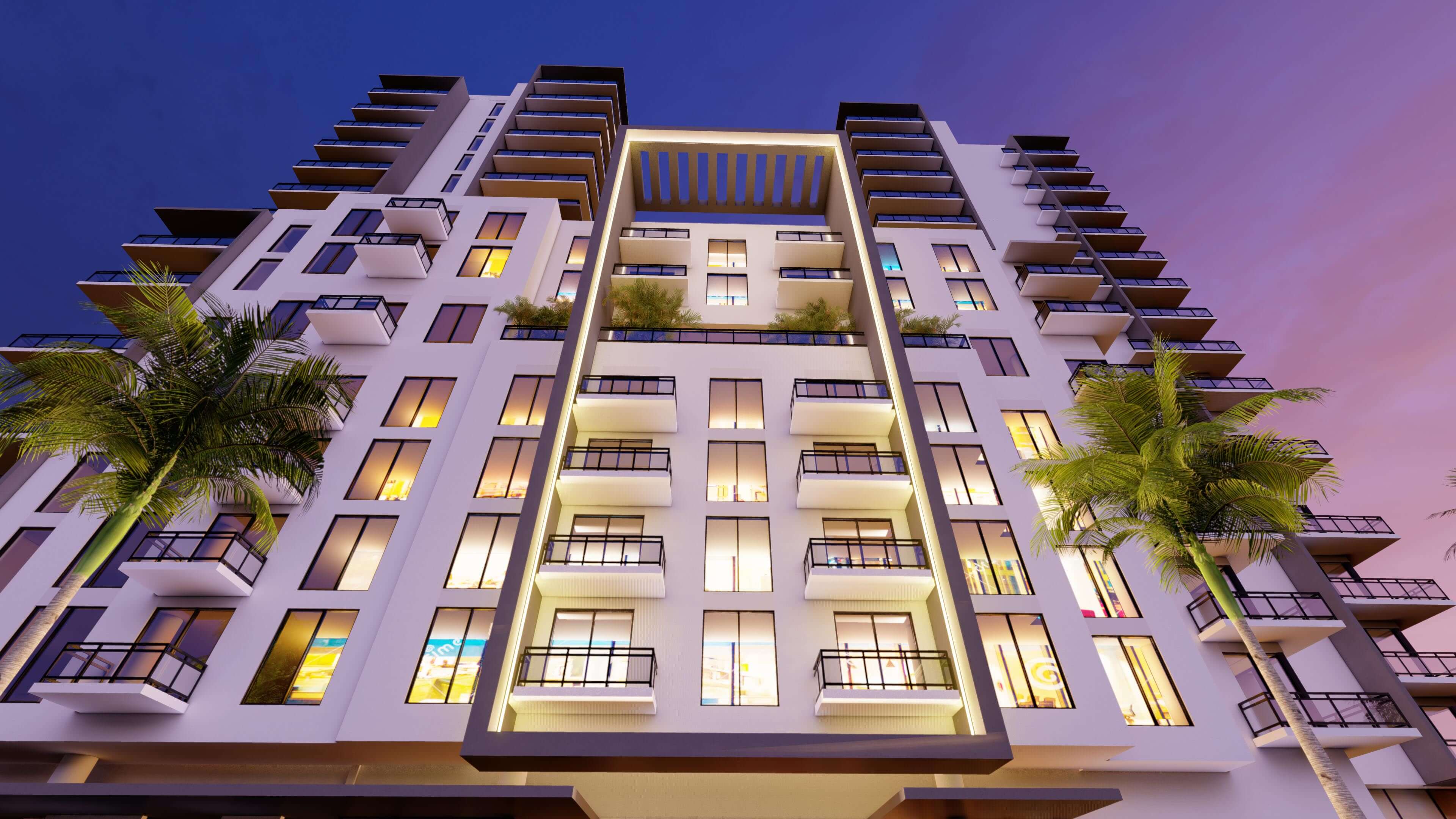 Symmetrical facade of River District 14 building illuminated at night