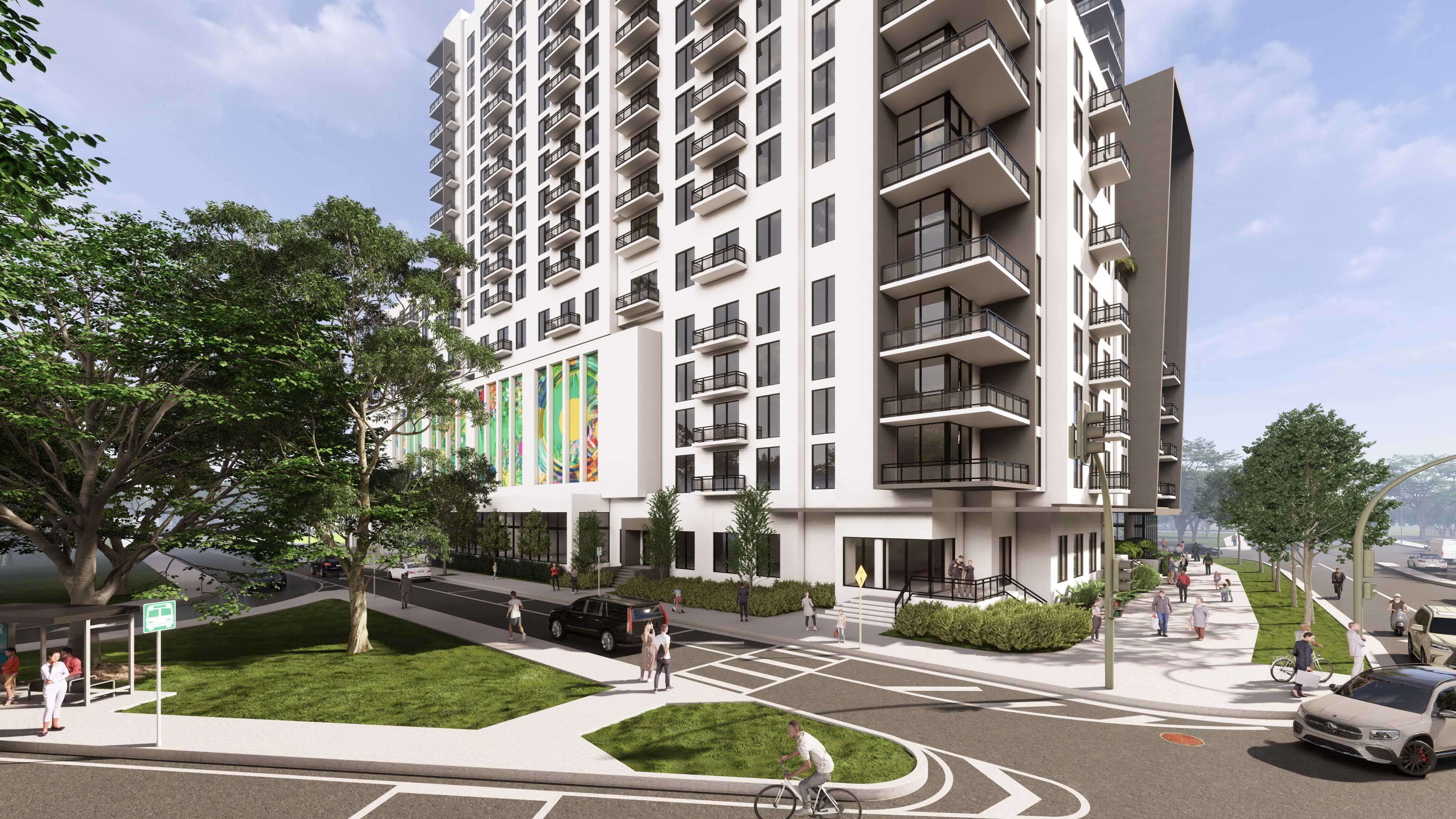 Street corner view of River District 14 showing architectural balconies and lively sidewalks