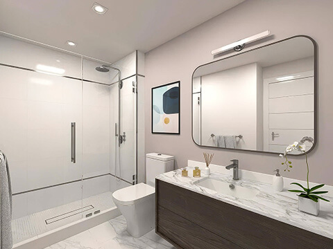Modern bathroom at Roble One Coconut Grove with glass walk-in shower, marble vanity and contemporary finishes
