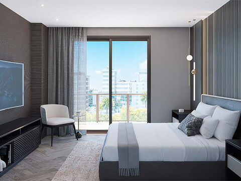 Modern bedroom interior at Smart Brickell Miami Tower II with large windows, neutral design, and city views