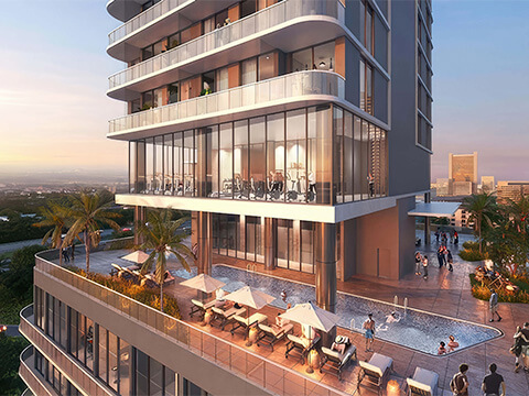 Rooftop amenities at Smart Brickell Miami Tower II featuring a pool deck, lounge seating, and glass-walled fitness center
