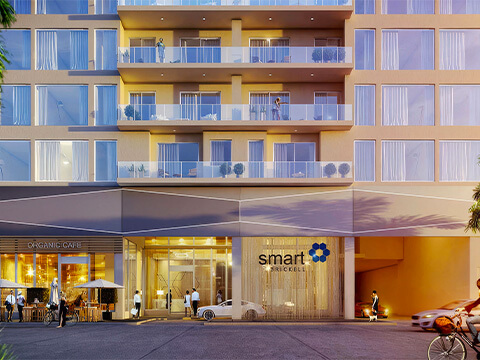 Street frontage view of Smart Brickell Miami Tower II with the Smart Brickell lobby signage and ground-floor shops