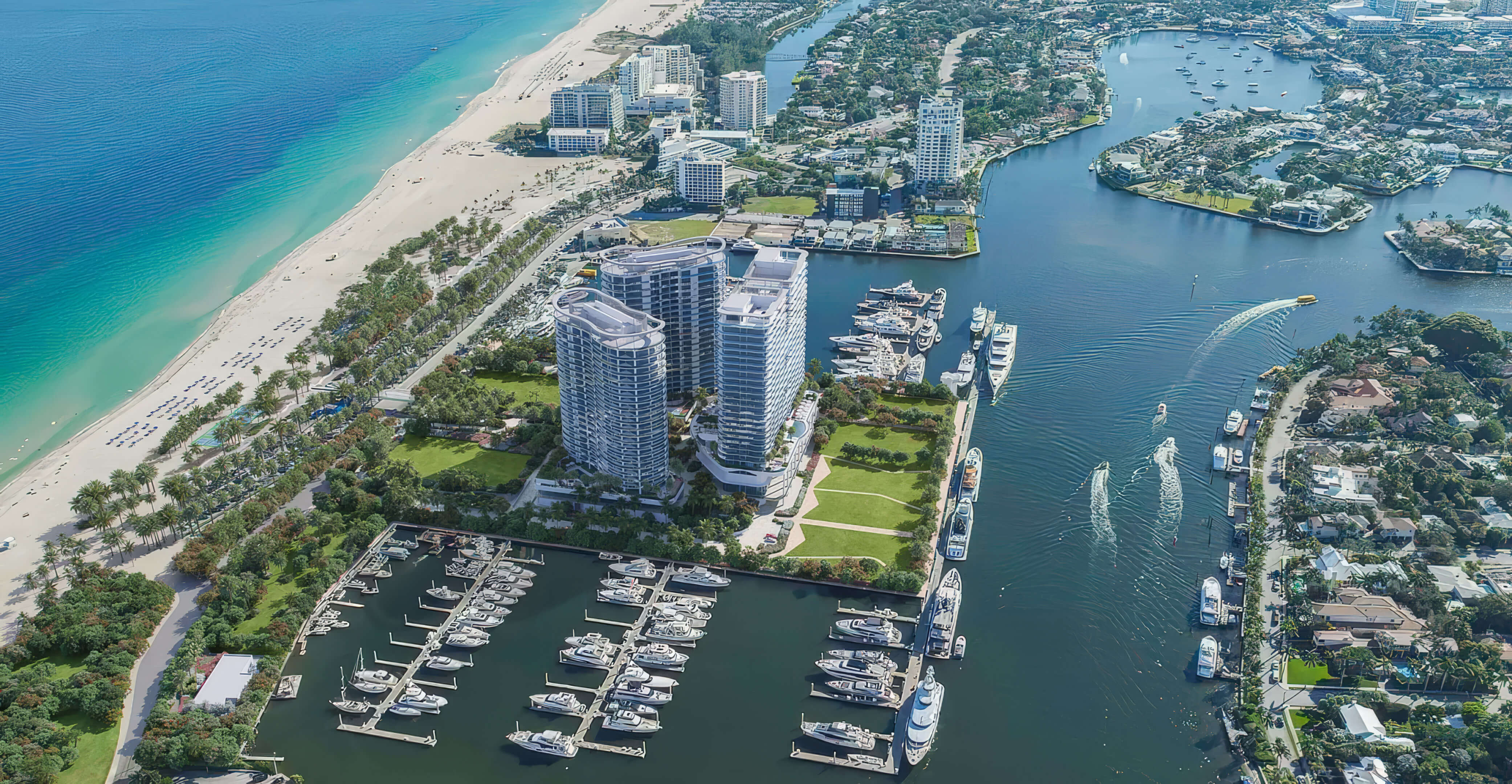 Aerial view of the waterfront site, yacht marina and beach at St Regis Residences Bahia Mar